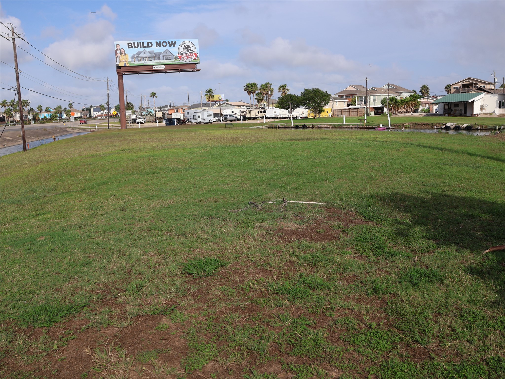 Farthest point on the property showing all three lots and billboard.