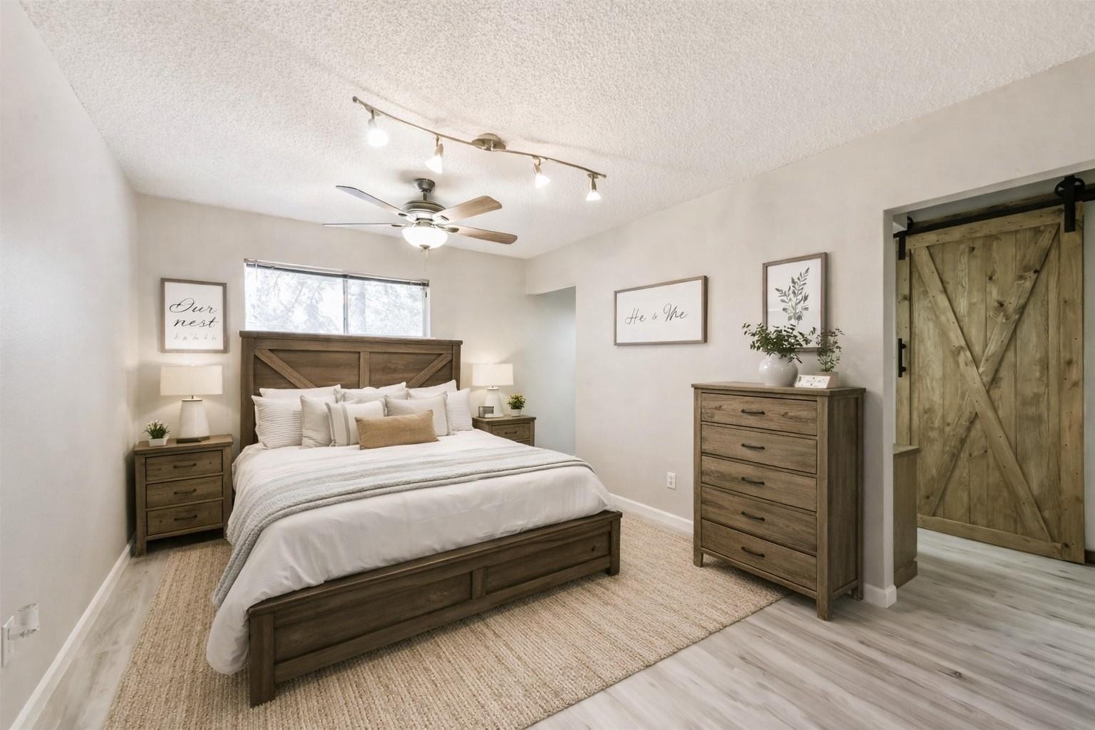 Virtually staged primary bedroom with en-suite bath.