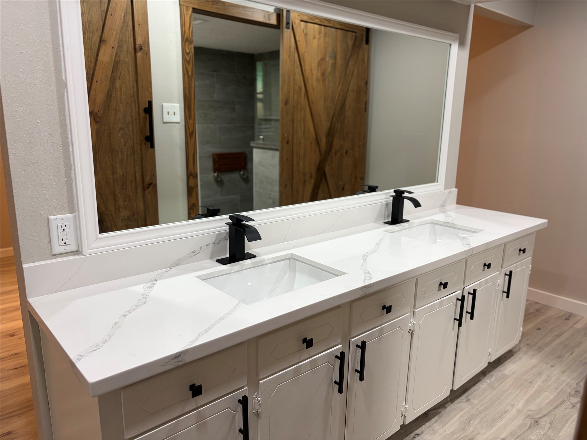 Dual sinks and plenty of counter space in the primary bathroom.