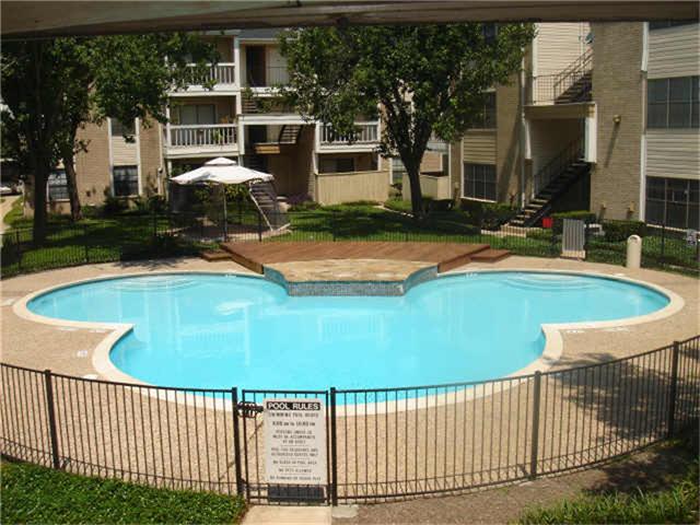 ONE OF TWO POOLS ON PROPERTY (MICKEY MOUSE POOL)