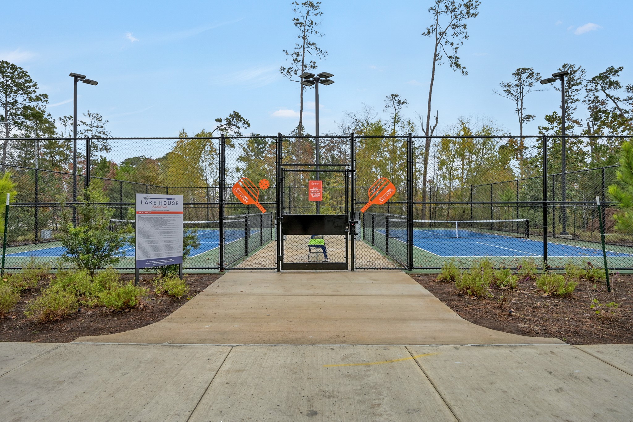 Community amenities including pickleball courts, basketball court and sand volleyball.