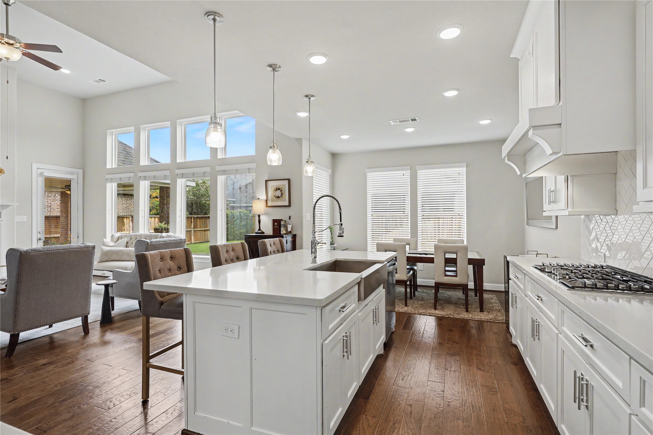 Open kitchen with central island overlooking the great room.