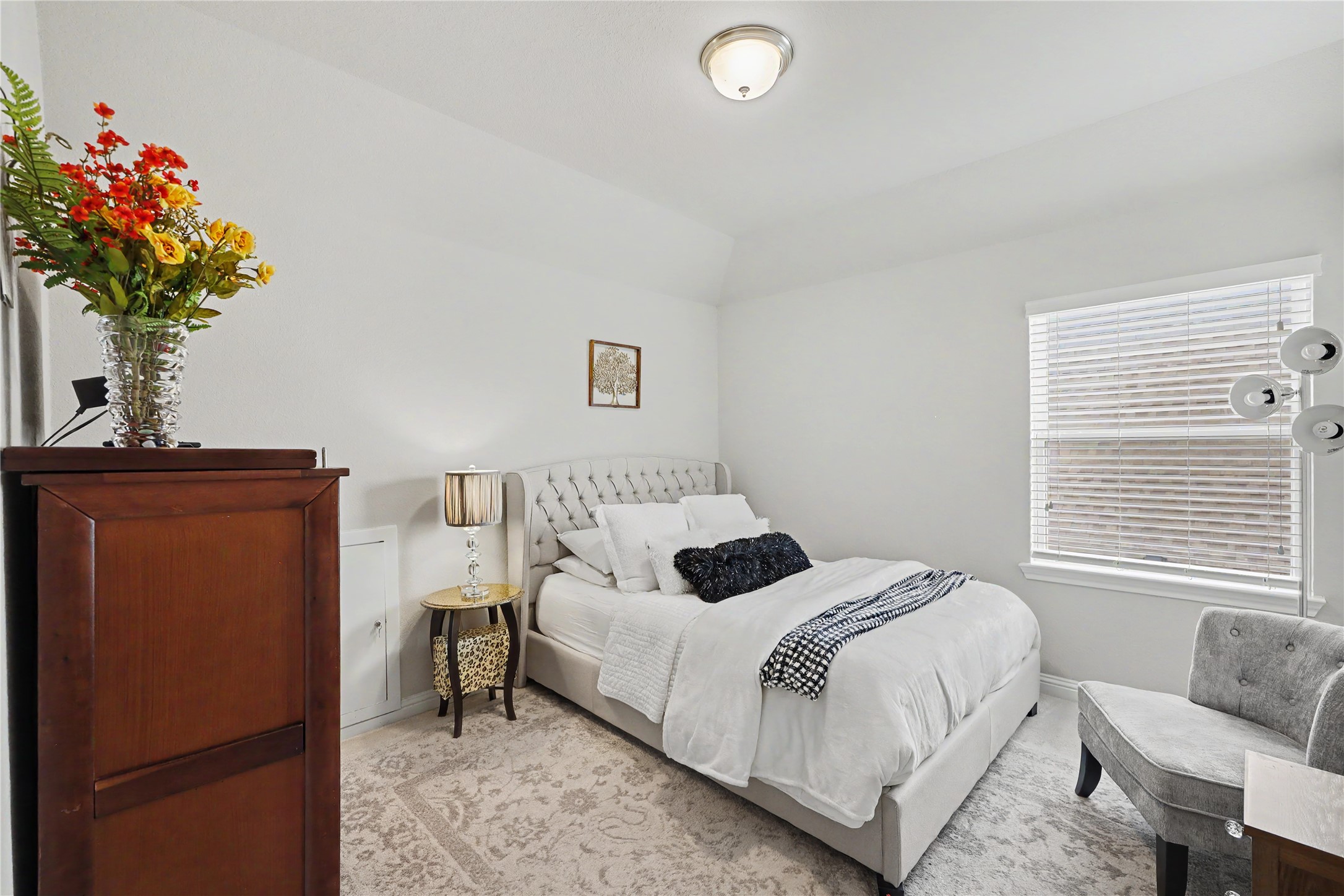 Additional secondary bedroom with neutral finishes and natural light.