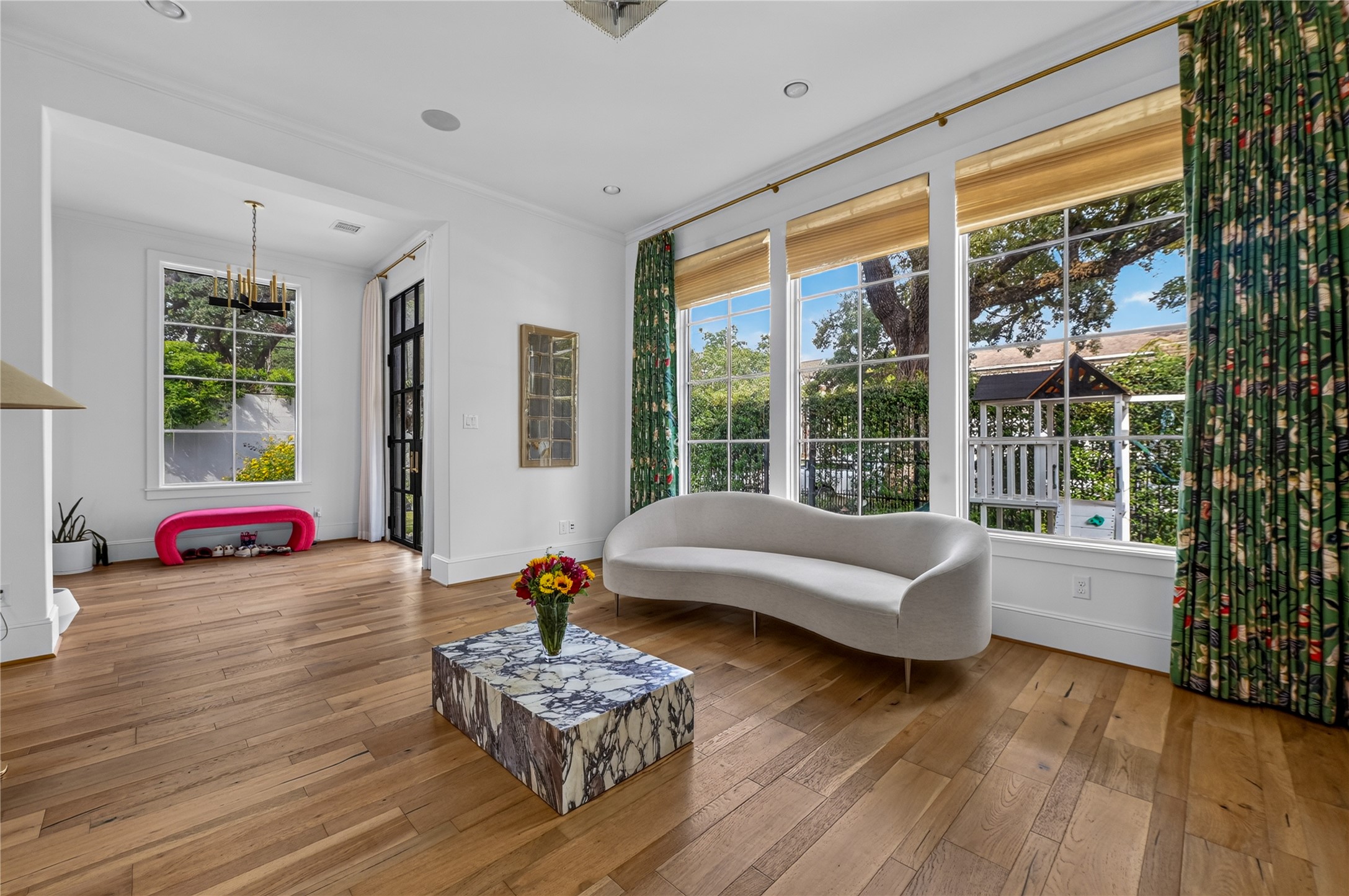 Just off the Foyer, your formal living room features picture windows overlooking the manicured front yard