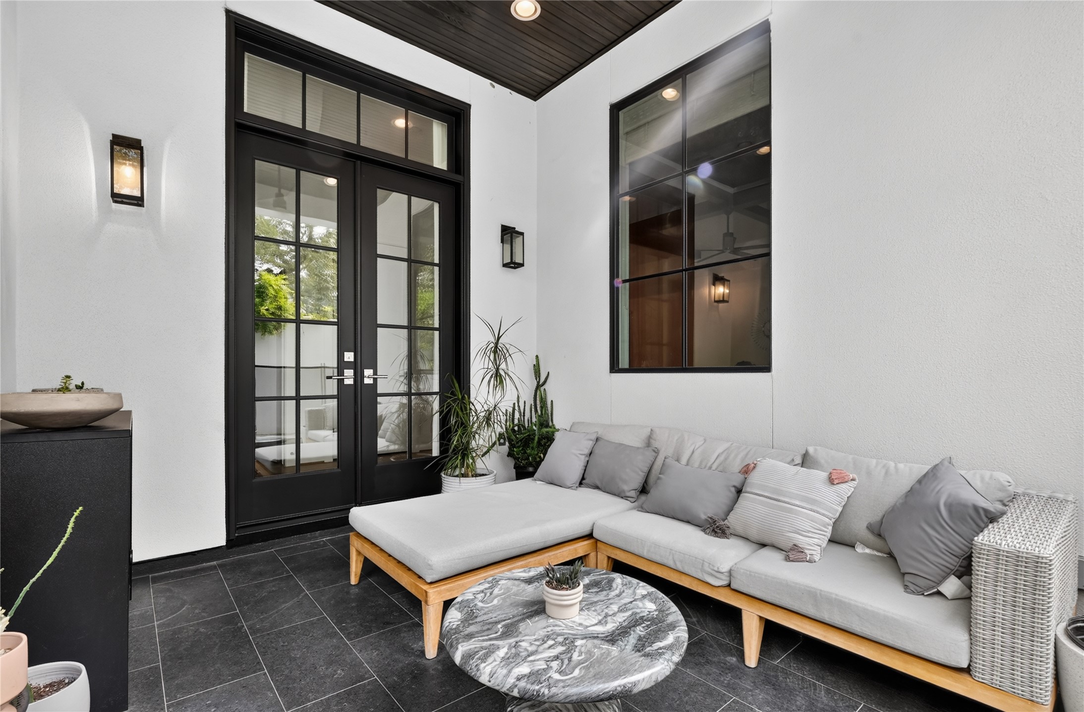 Private, covered patio can be enjoyed in any weather.
