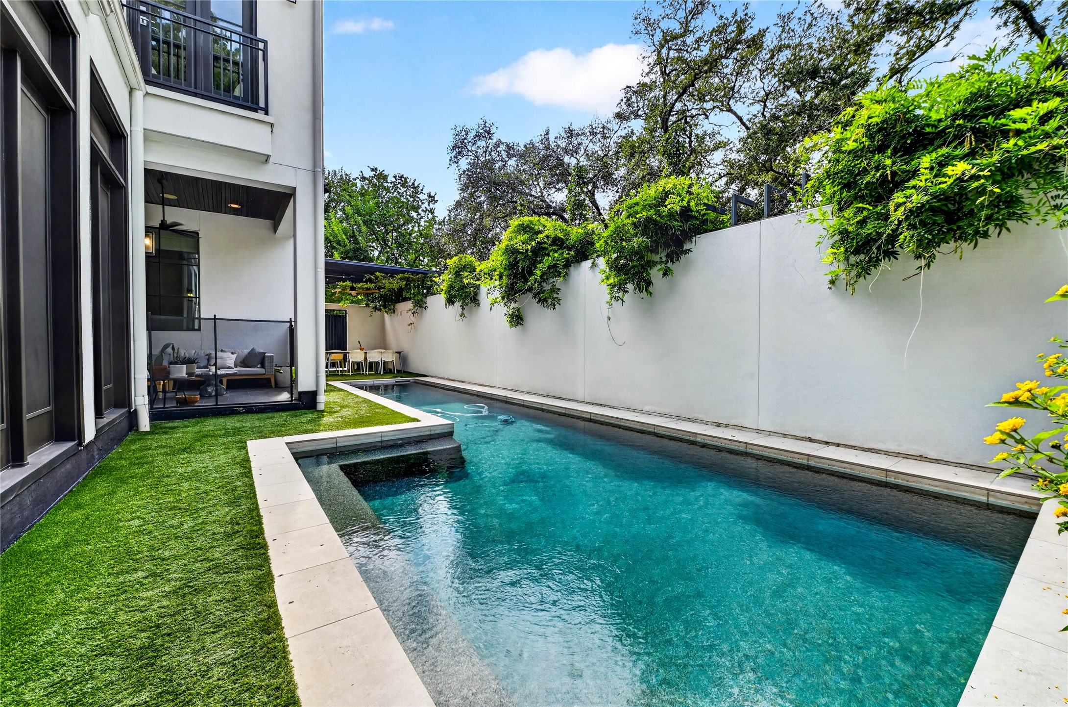 Outside is where you will always be with this elegant pool that is private with large stucco border wall.
