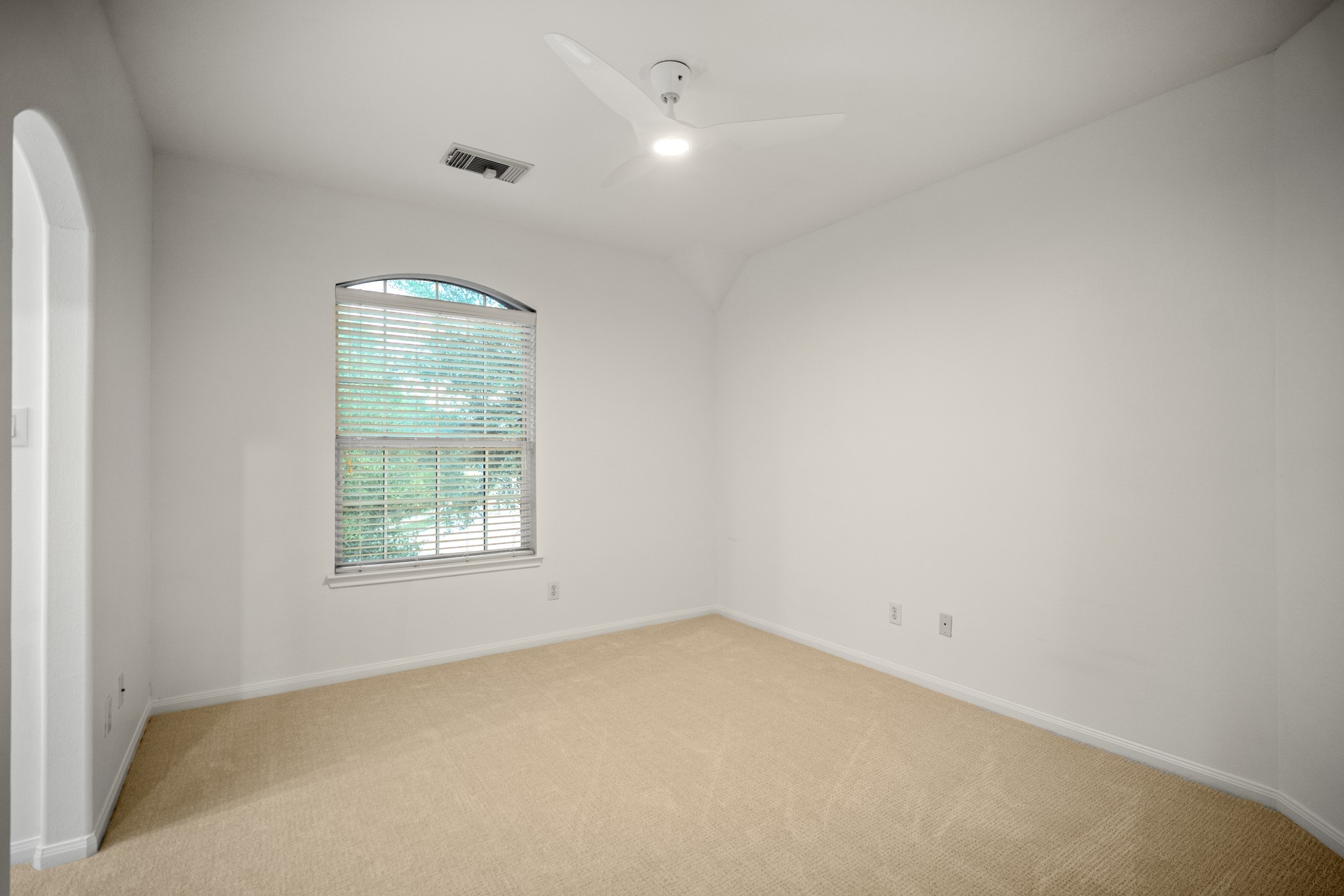 Bedroom number 2 which is off the game room and offers easy access to the Hollywood bathroom and has a good size closet.