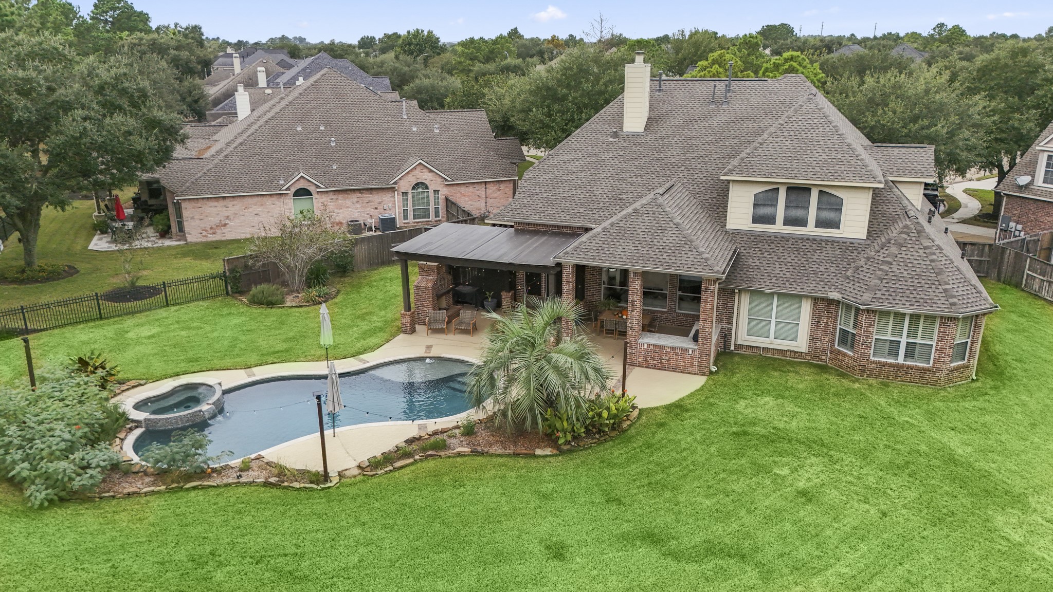 Located on nearly half an acre on the third hole of the Loch golf course, sits this beautiful private oasis with sparkling pool, raised spa, expanded decking, covered patio, extended pergola, outdoor fireplace, as well as beautiful landscaping with storage shed.