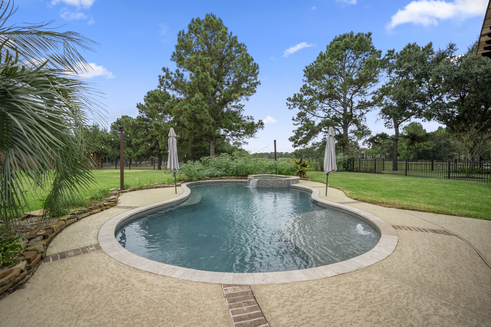 The luxury extends outdoors to a spectacular, resort-style backyard oasis, with sparkling swimming pool and raised spa, surrounded by an expansive patio, this private paradise is entirely move-in ready and designed to impress!