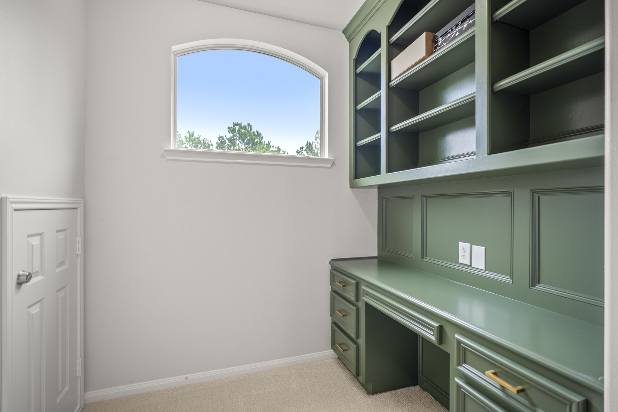 Here is a close-up view of the study nook off game room, which offer a built in desk area as well as a window that streams in natural light.