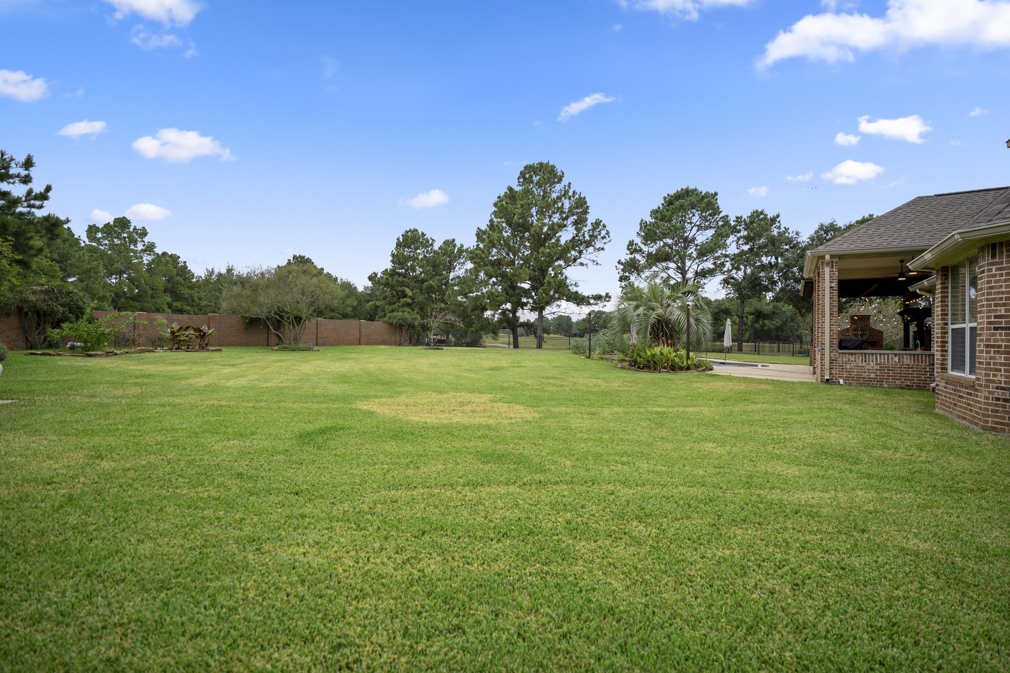 The generous lawn area offers hours of fun outdoors, while the yard has plenty of room for kids and dogs to play it also features a custom-built shed on slab. The home has a NEW Roof & New AC 2026. Epoxy Floors in garage with overhead garage storage system.