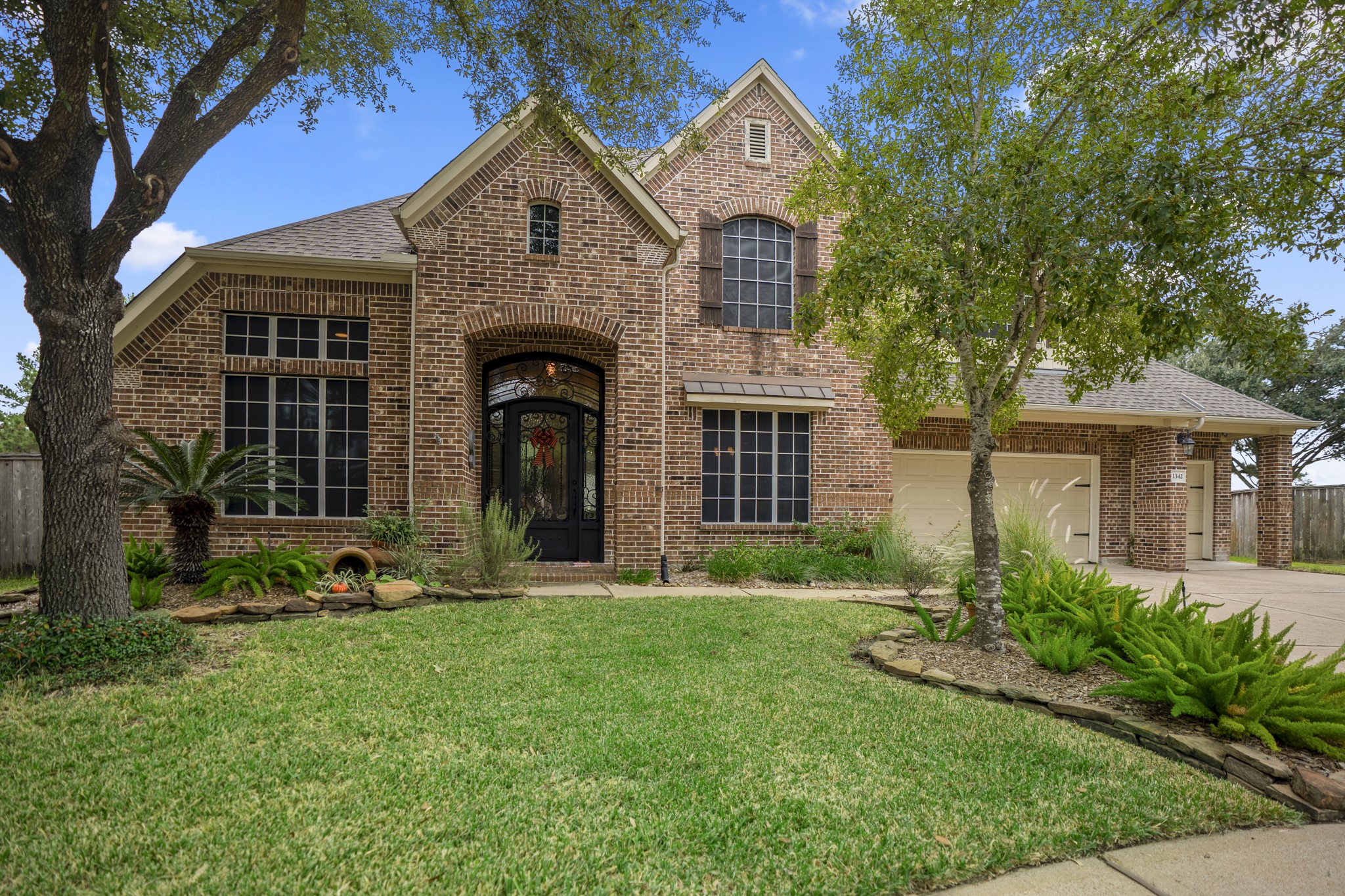 This beautiful home has a refined interior & impressively updated, low maintenance brick elevation, stunning wrought iron doors welcome you home.