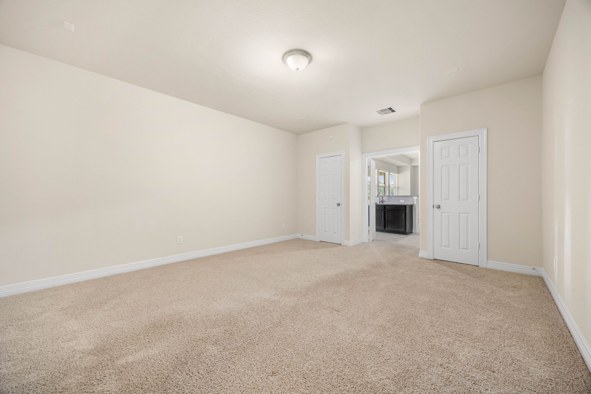 Two shelved storage closets in the media room are perfect for storing games, toys, your movie collection, and more!