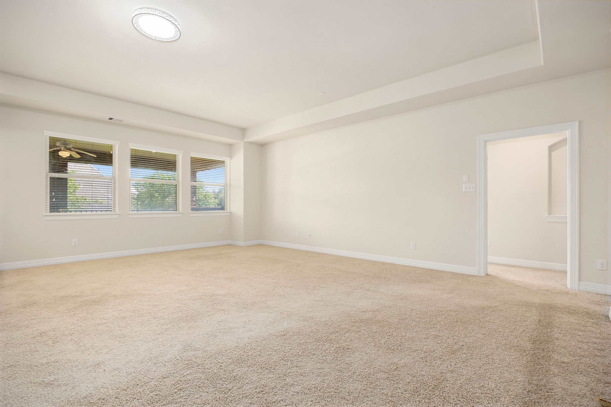 Perfect for Privacy: On one end of the game room is the second floor primary suite entry. The opposite end has 3 secondary bedrooms.