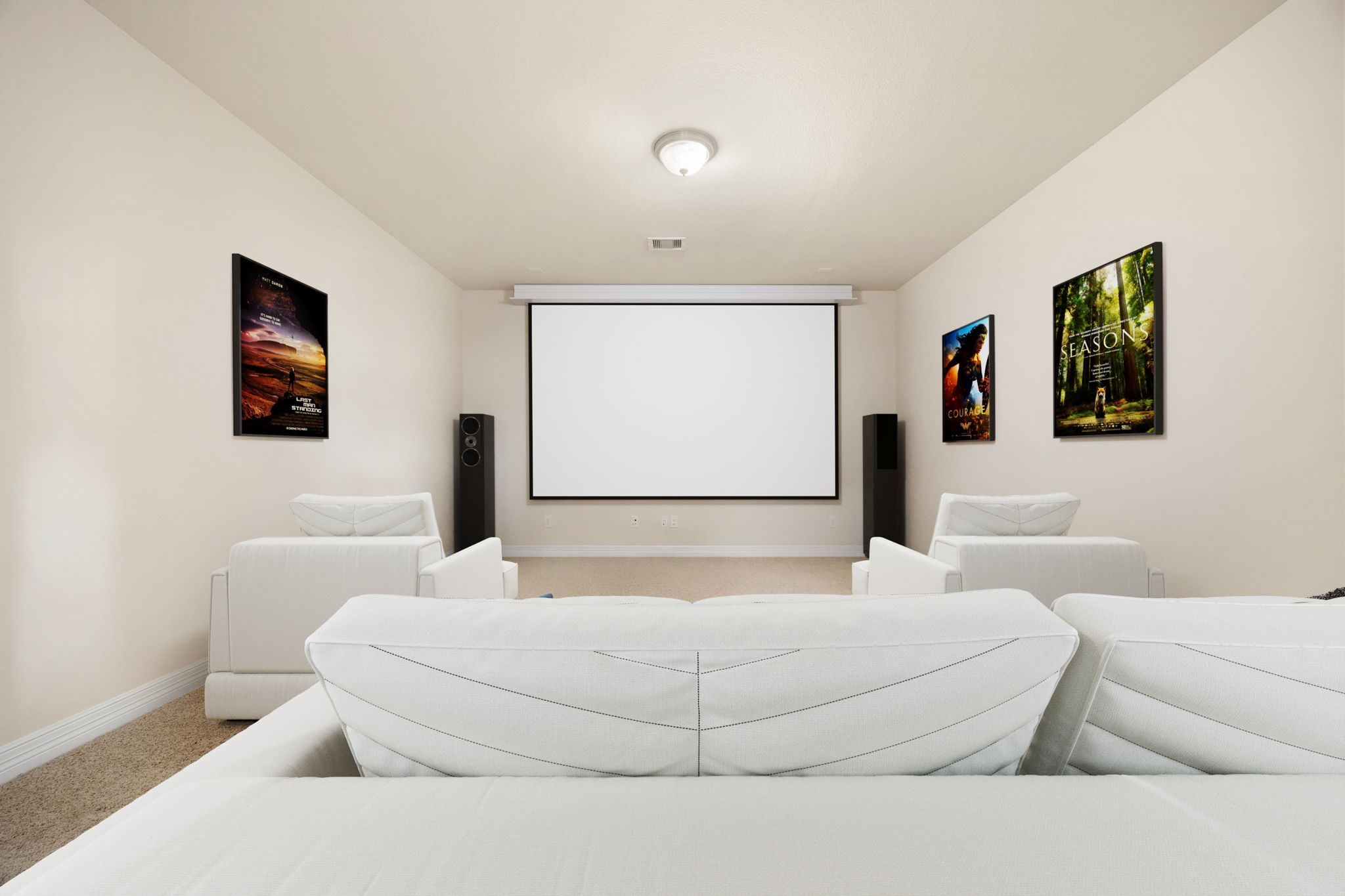 Enjoy movie nights at home in the private media room offering the ideal layout for a projector,
large screen, surround sound, and theater-style seating. (Virtually staged to showcase possibilities)