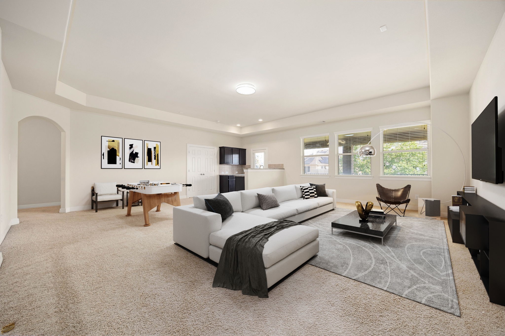 HUGE, impressive upstairs game room offers exceptional space for entertaining, relaxing, playing, or creating multiple activity zones. Conveniently located with direct access to the second floor covered deck.  (Virtually staged to showcase possibilities)