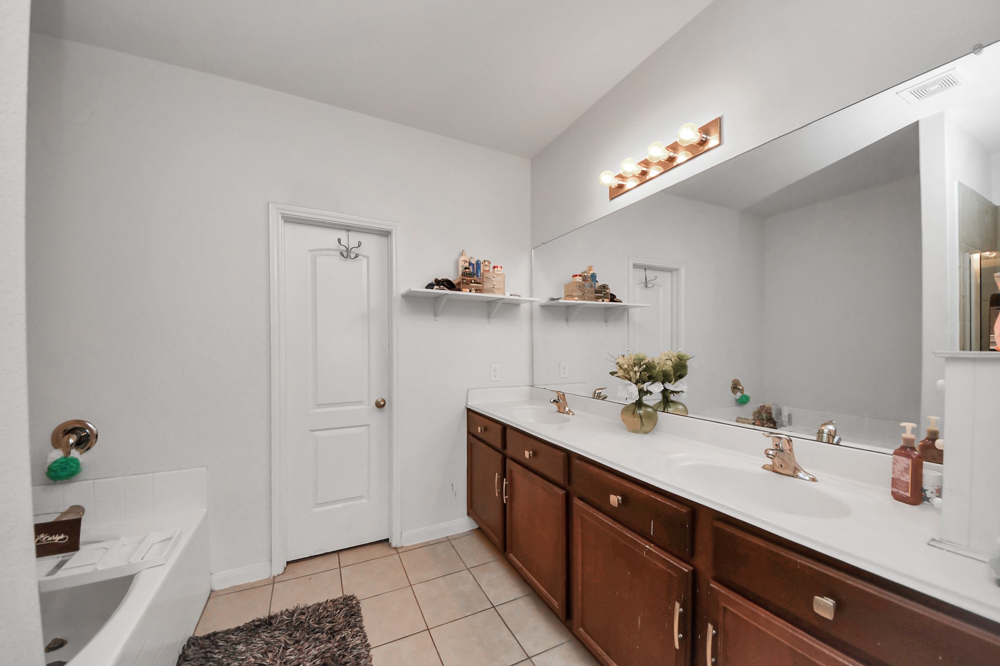 Double Vanity in primary suite restroom.