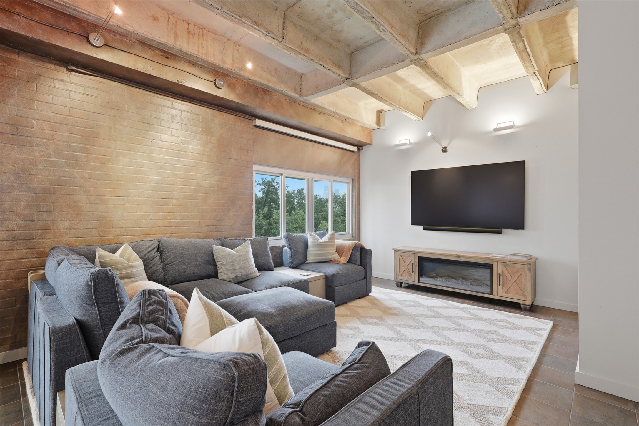 Massive windows in every room with sleek window coverings