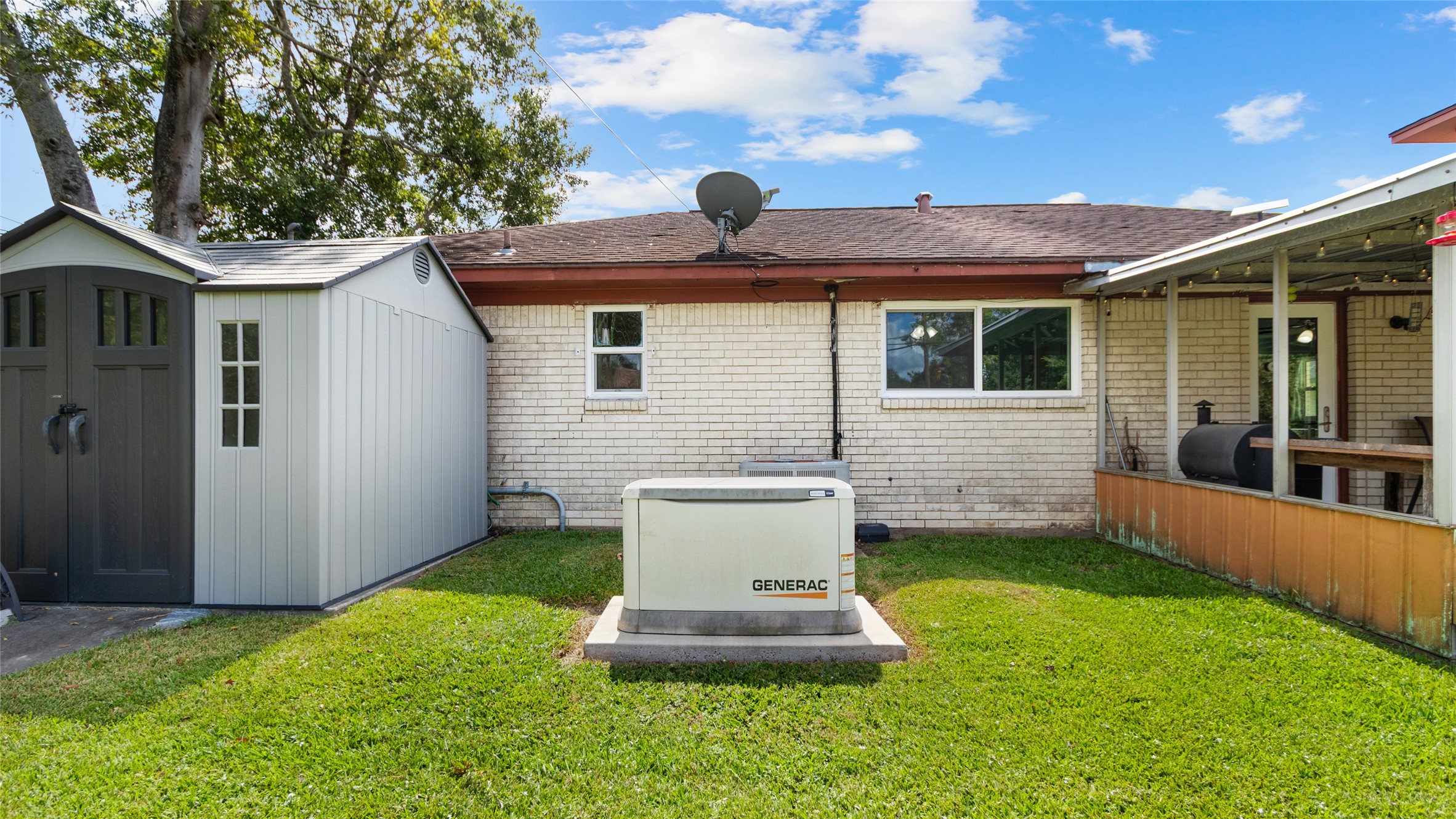 Whole-home Generac generator provides valuable backup power, while an additional outdoor storage shed offers convenient space for tools, lawn equipment, and seasonal items.