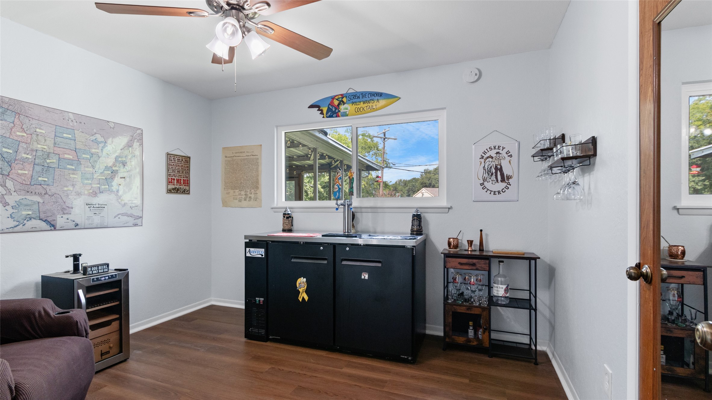 Versatile bonus room offers plenty of space for a home office, game room, hobby space, or additional living area, with a large window providing natural light.