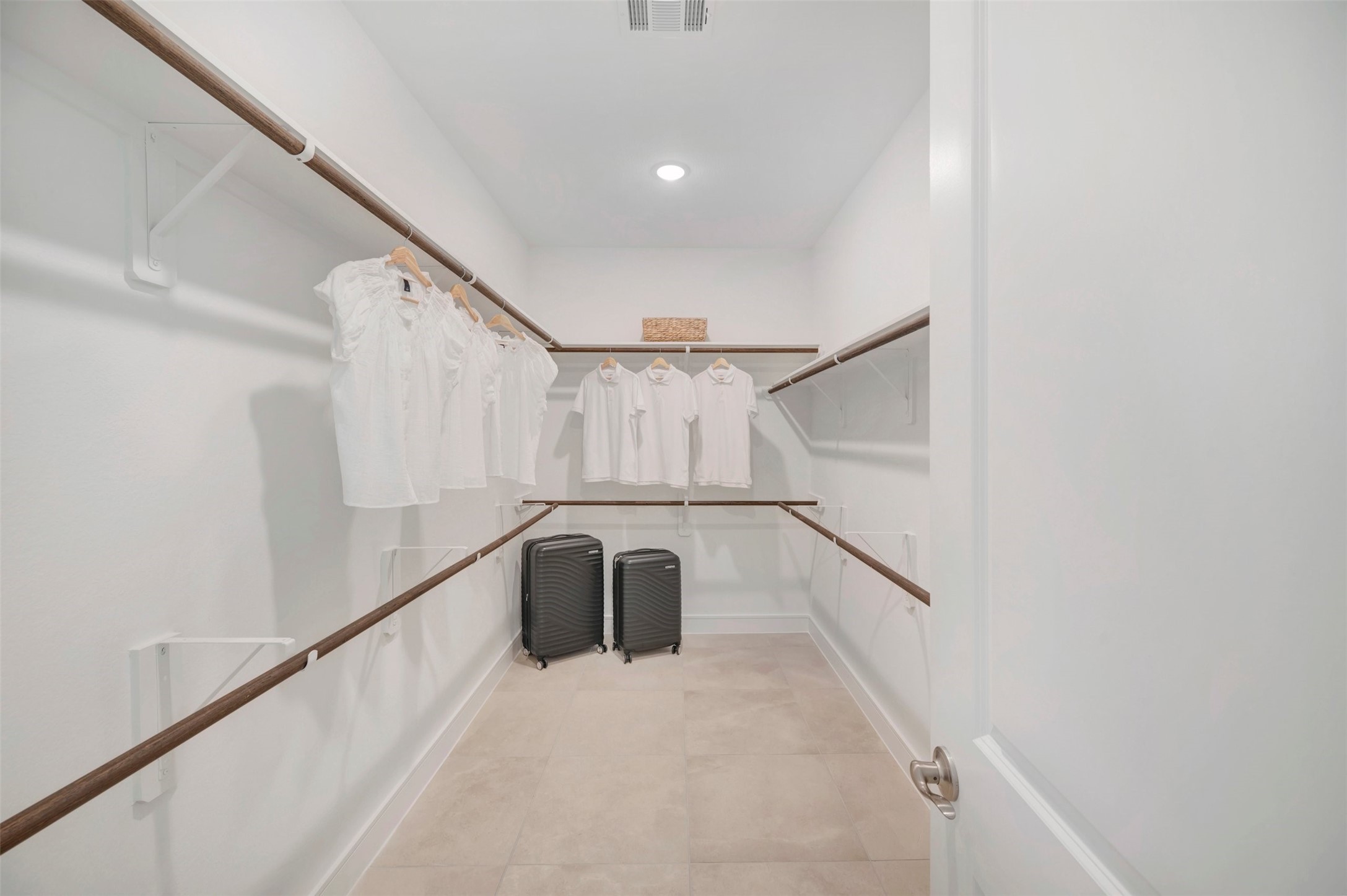 Primary walk-in closet (*Photo not of actual home and used for illustration purposes only.)