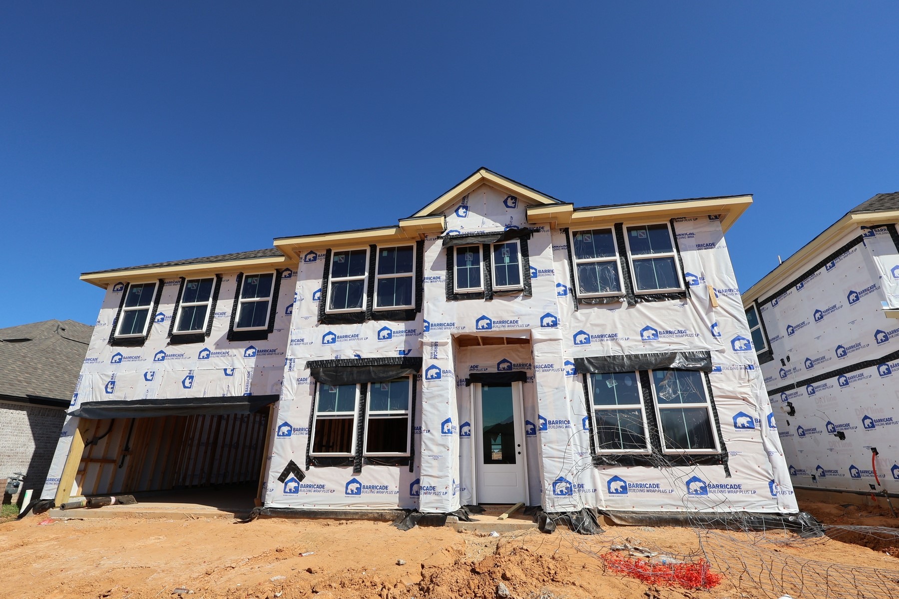 Two story home with 5 beds, 4.5 baths, and 3 car tandem garage