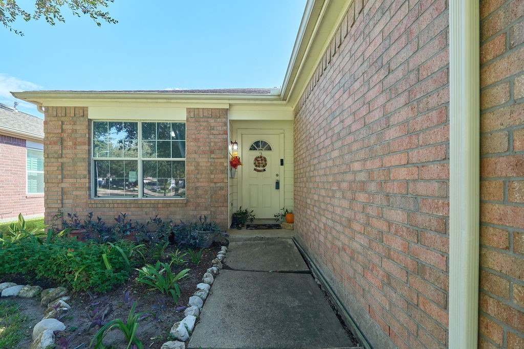 A warm welcome awaits! A charming brick-accented entrance creates an inviting first impression. A warm welcome awaits! A charming brick-accented entrance creates an inviting first impression.