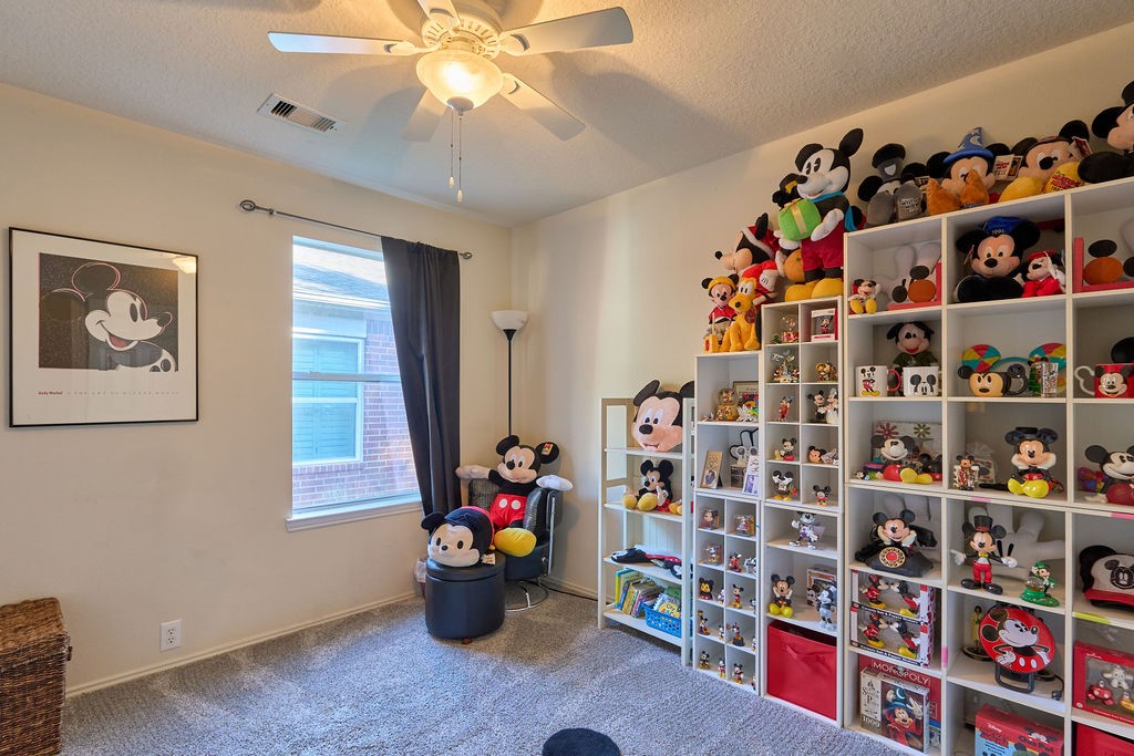 A bright and versatile bedroom offering endless possibilities for relaxation, creativity, or personal space.