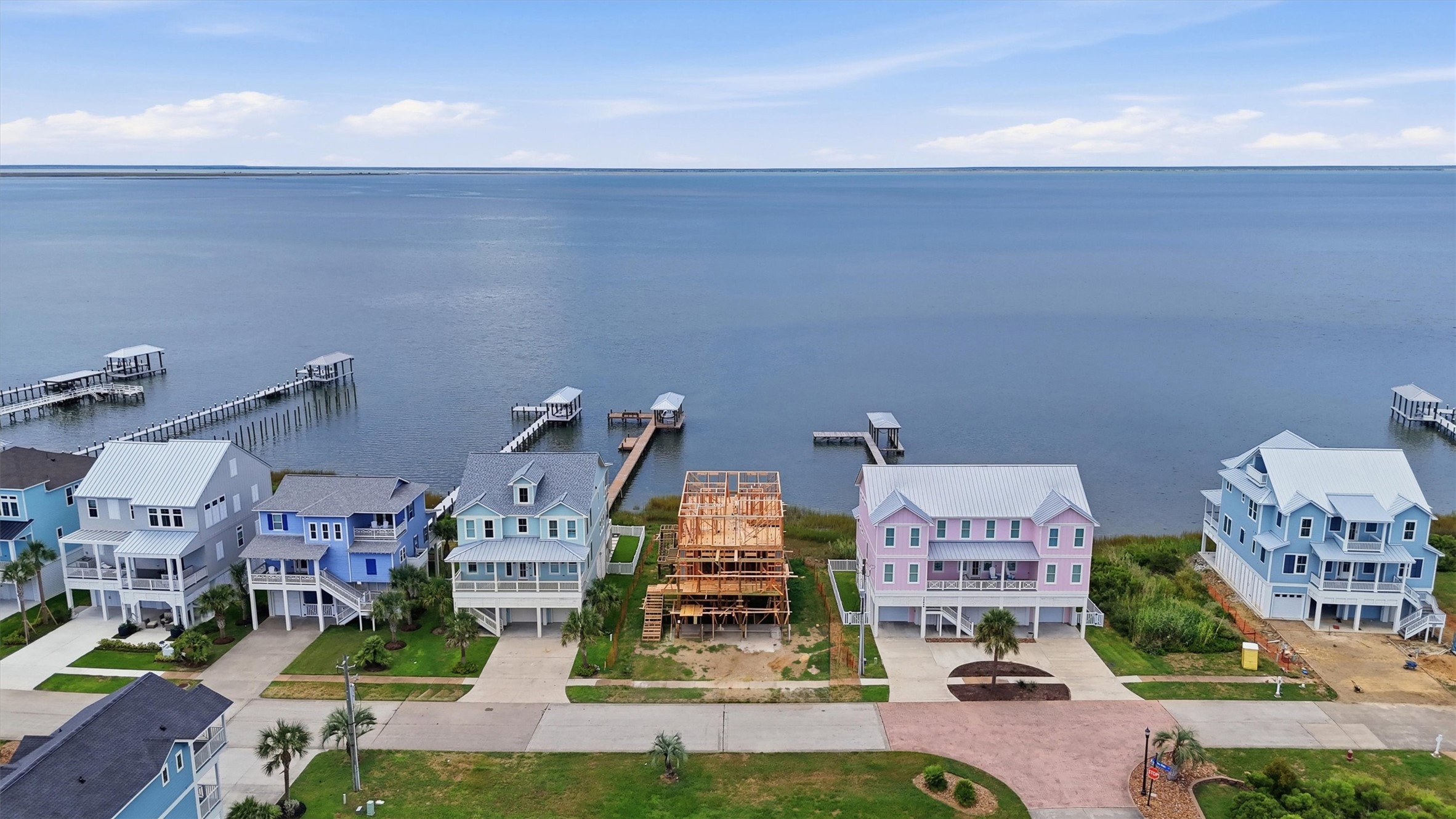 Own among the coveted bayfront pier capable custom homes in Baywater at Pointe West Own among the coveted bayfront pier capable custom homes in Baywater at Pointe West