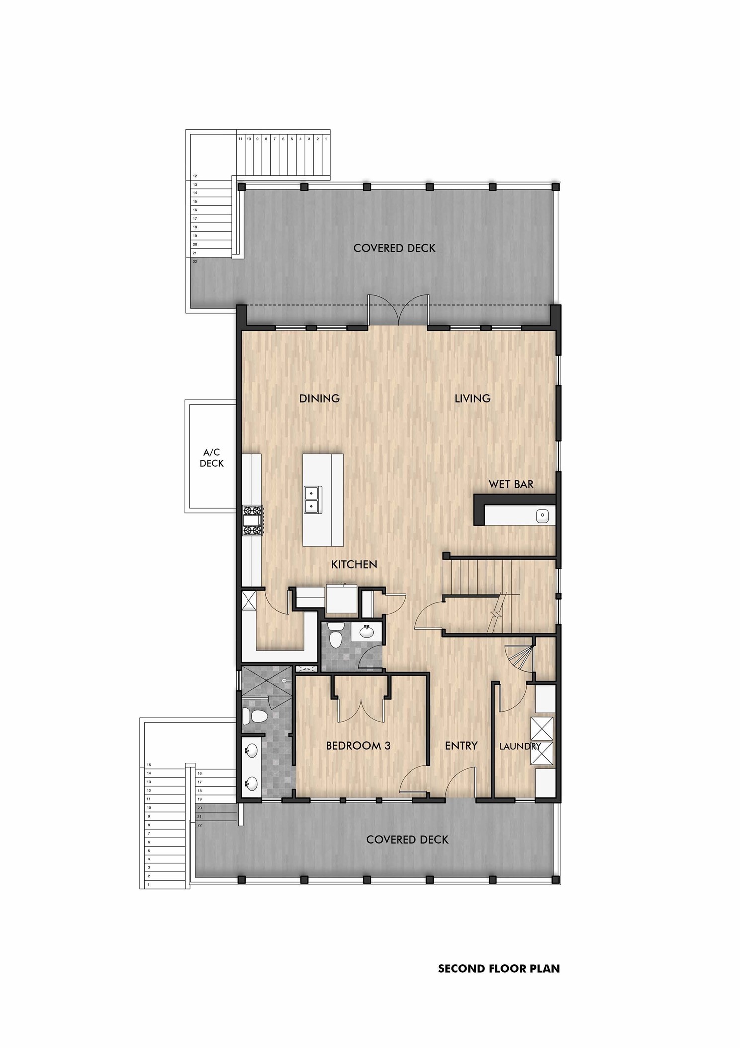 The main living level with an open-concept family, dining, and kitchen spaces center around a 9' island.