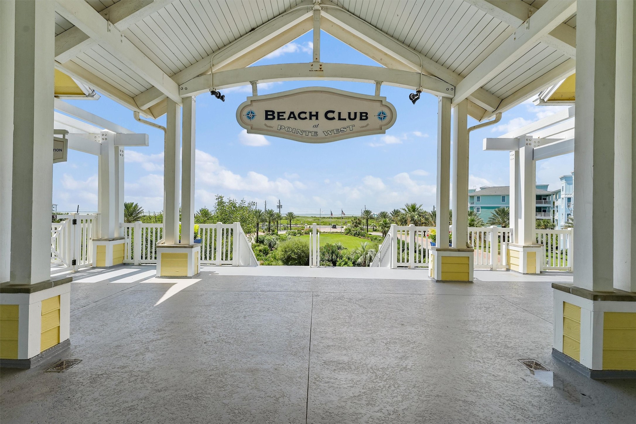 A welcoming entryway into the
Pointe West Beach Club invites
you to enjoy dining, pools, and
beachfront activities just steps
from the shore.