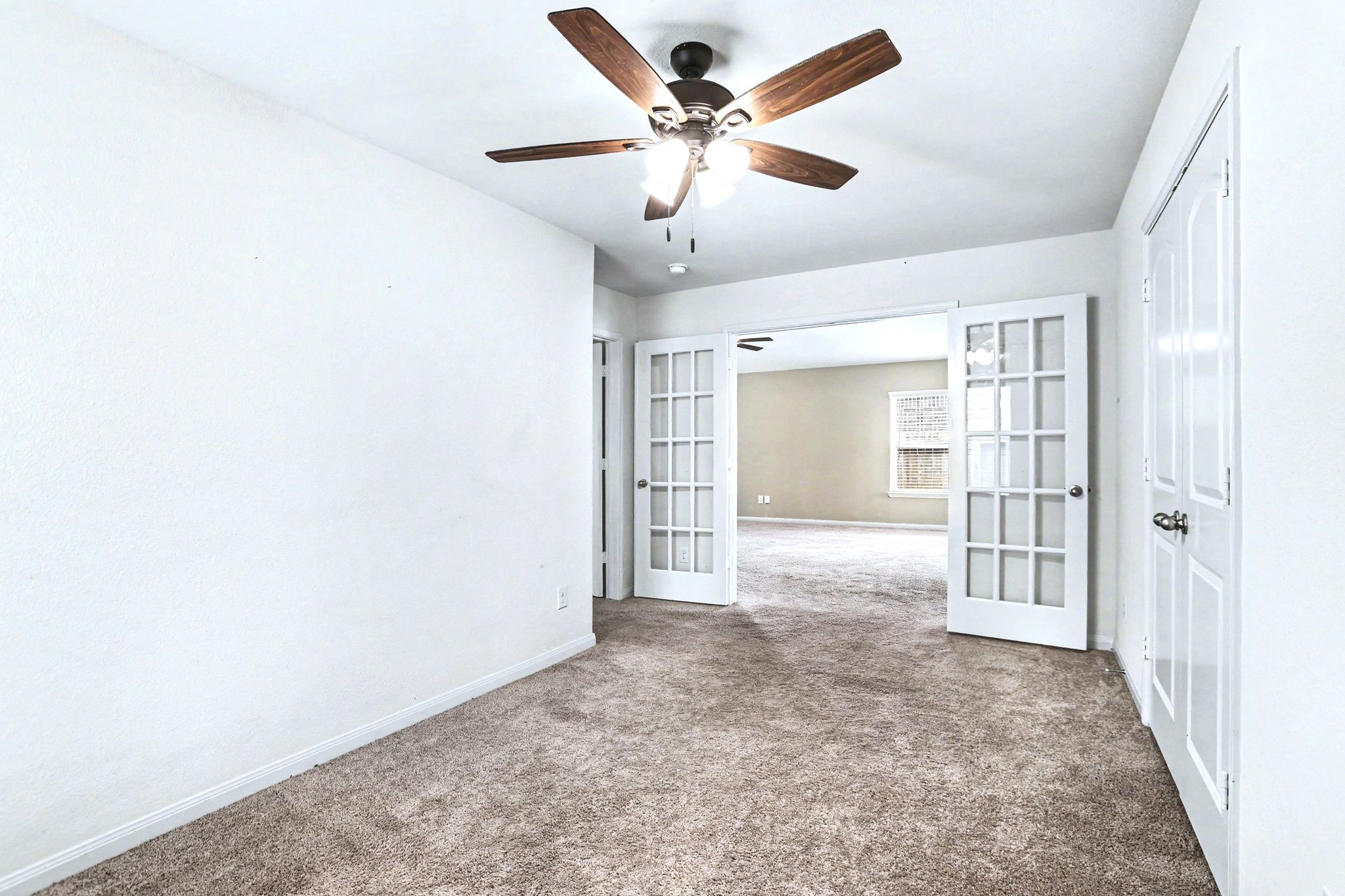 View of the office looking in toward the living space. This could easily be a 4th bedroom with a large closet.