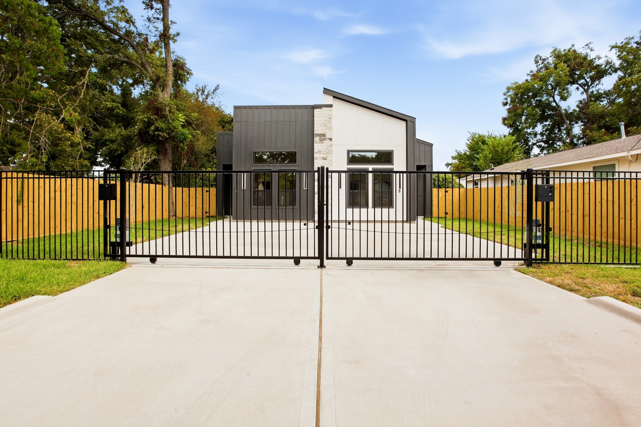 Striking modern exterior with clean lines and a welcoming approach.