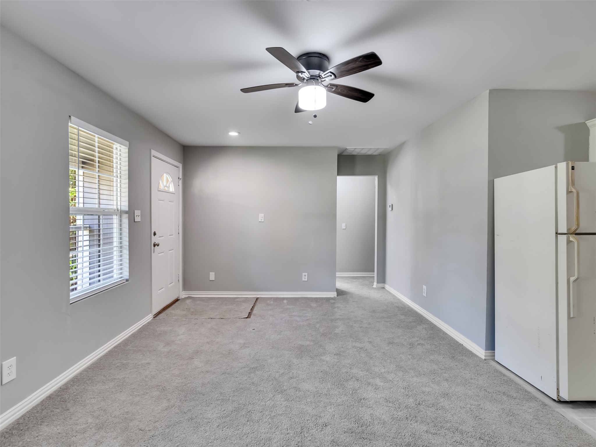 Living room that looks out onto the front yard. Living room that looks out onto the front yard.