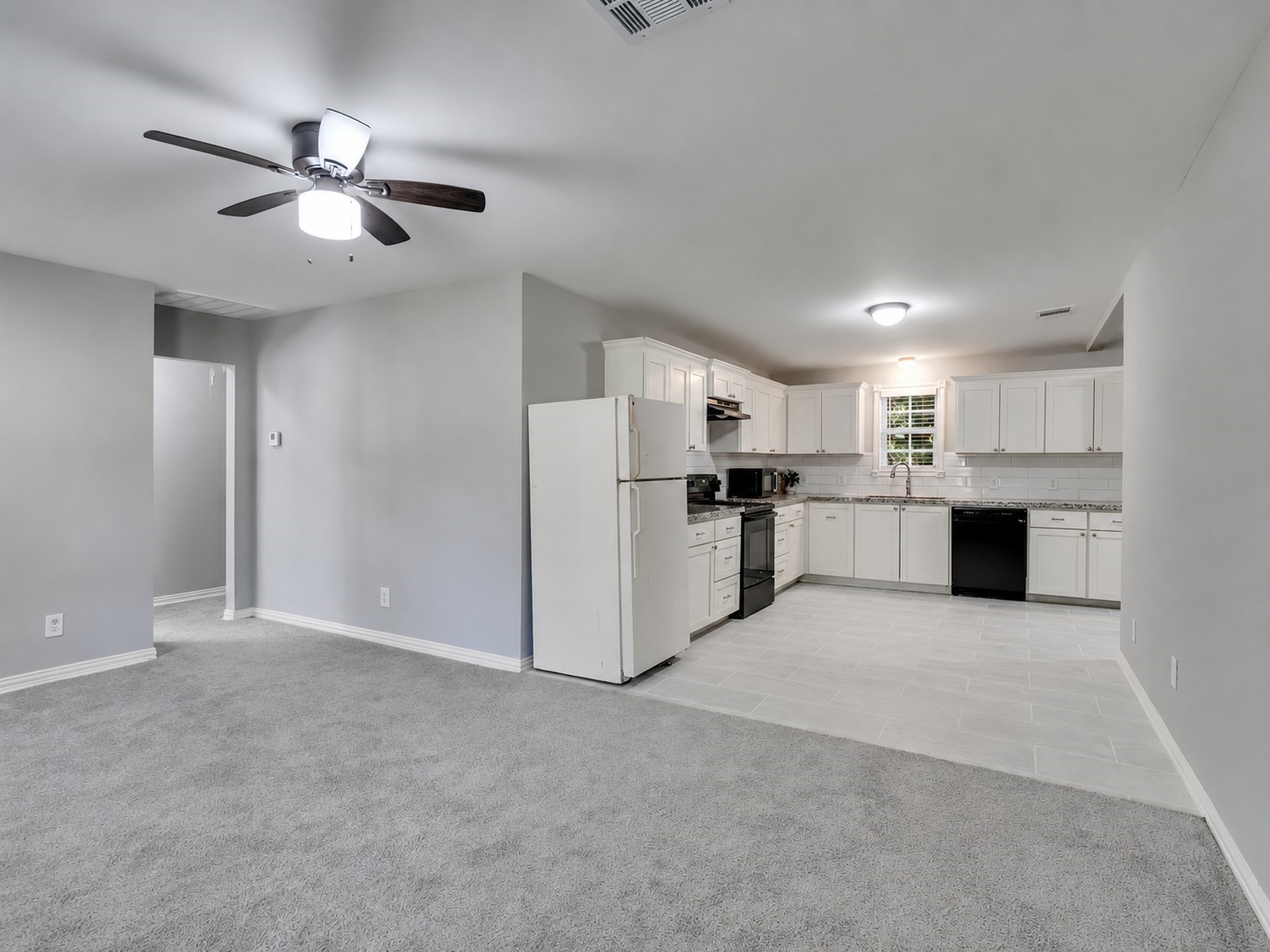Kitchen is open to the family room. Kitchen is open to the family room.