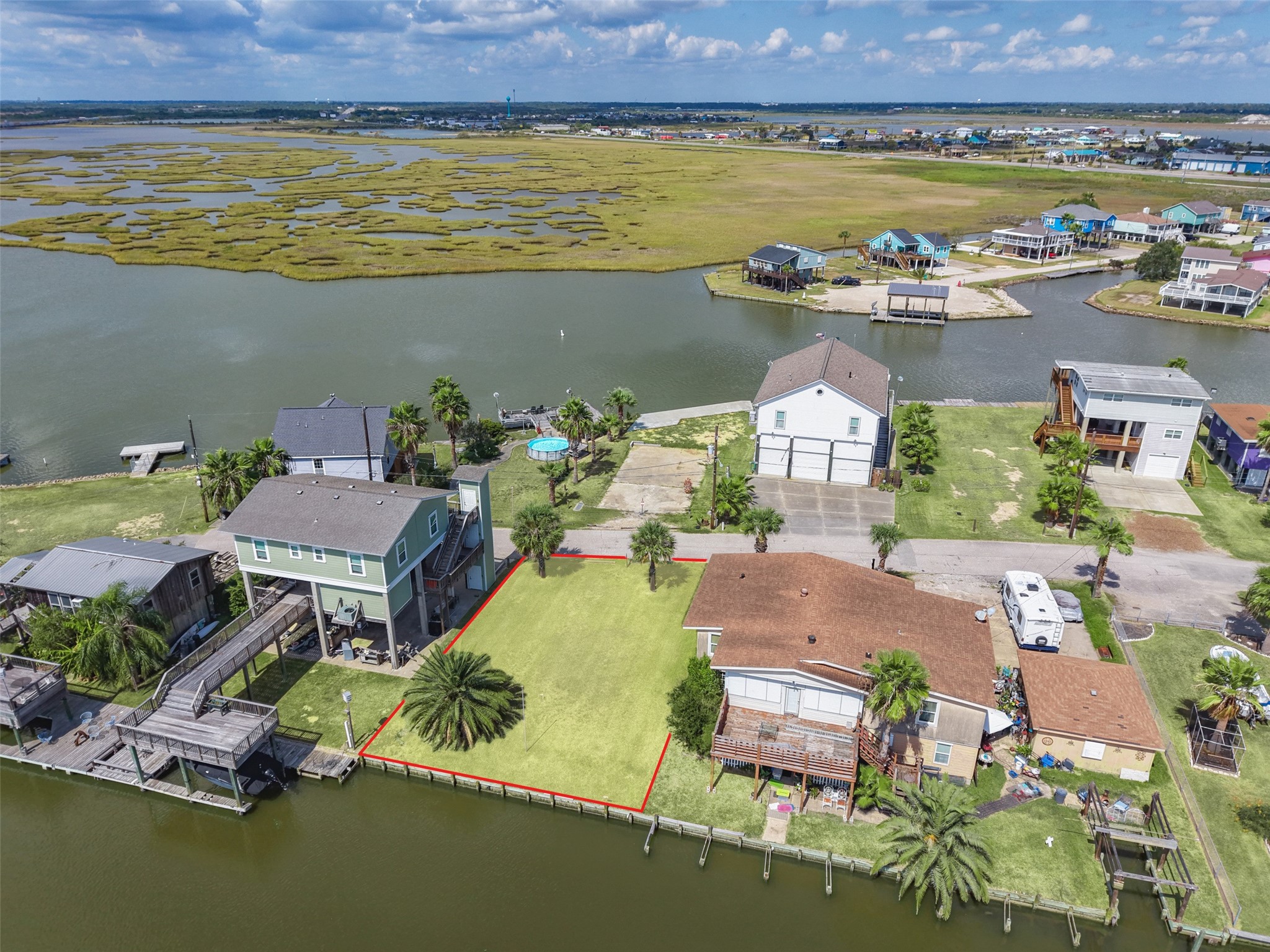 Pull back and the whole picture comes together: canal, marsh and open water past the last row of homes. Galveston is about 8 miles away across the causeway, and Houston is about an hour up I-45. Pull back and the whole picture comes together: canal, marsh and open water past the last row of homes. Galveston is about 8 miles away across the causeway, and Houston is about an hour up I-45.