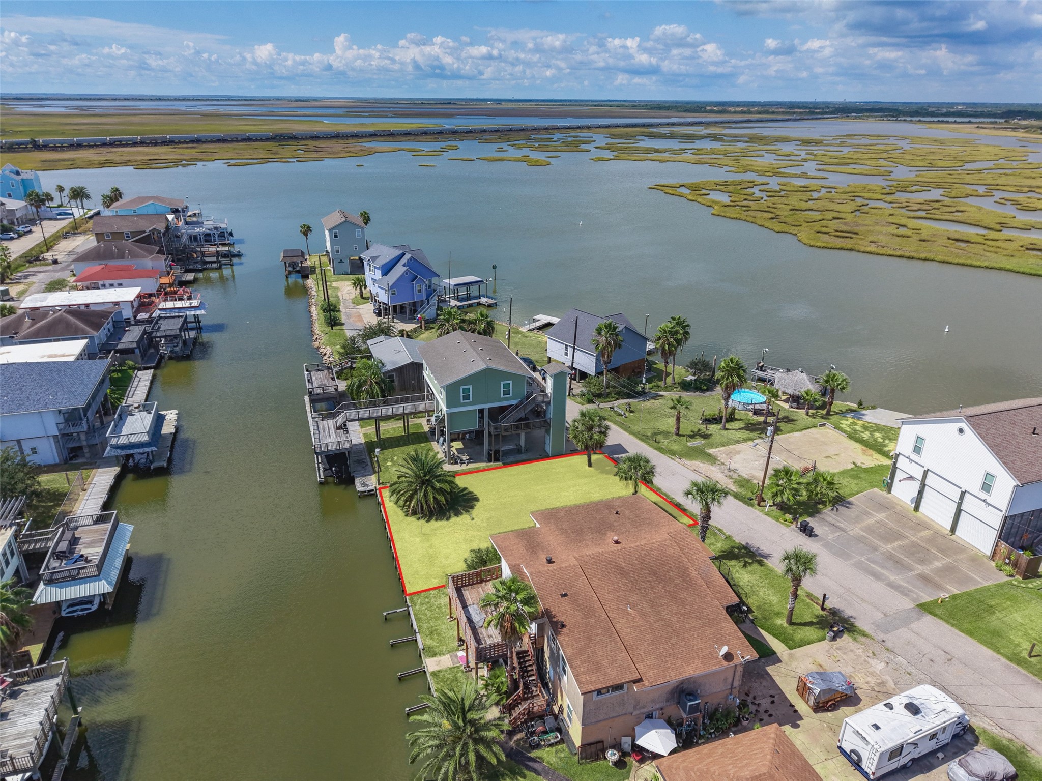The lot outlined from above. It sits a few lots from the end of Lakeside Drive with the canal along the back; follow it out for quick access to Jones Bay and the Galveston Bay system. Newer homes on both sides. The lot outlined from above. It sits a few lots from the end of Lakeside Drive with the canal along the back; follow it out for quick access to Jones Bay and the Galveston Bay system. Newer homes on both sides.