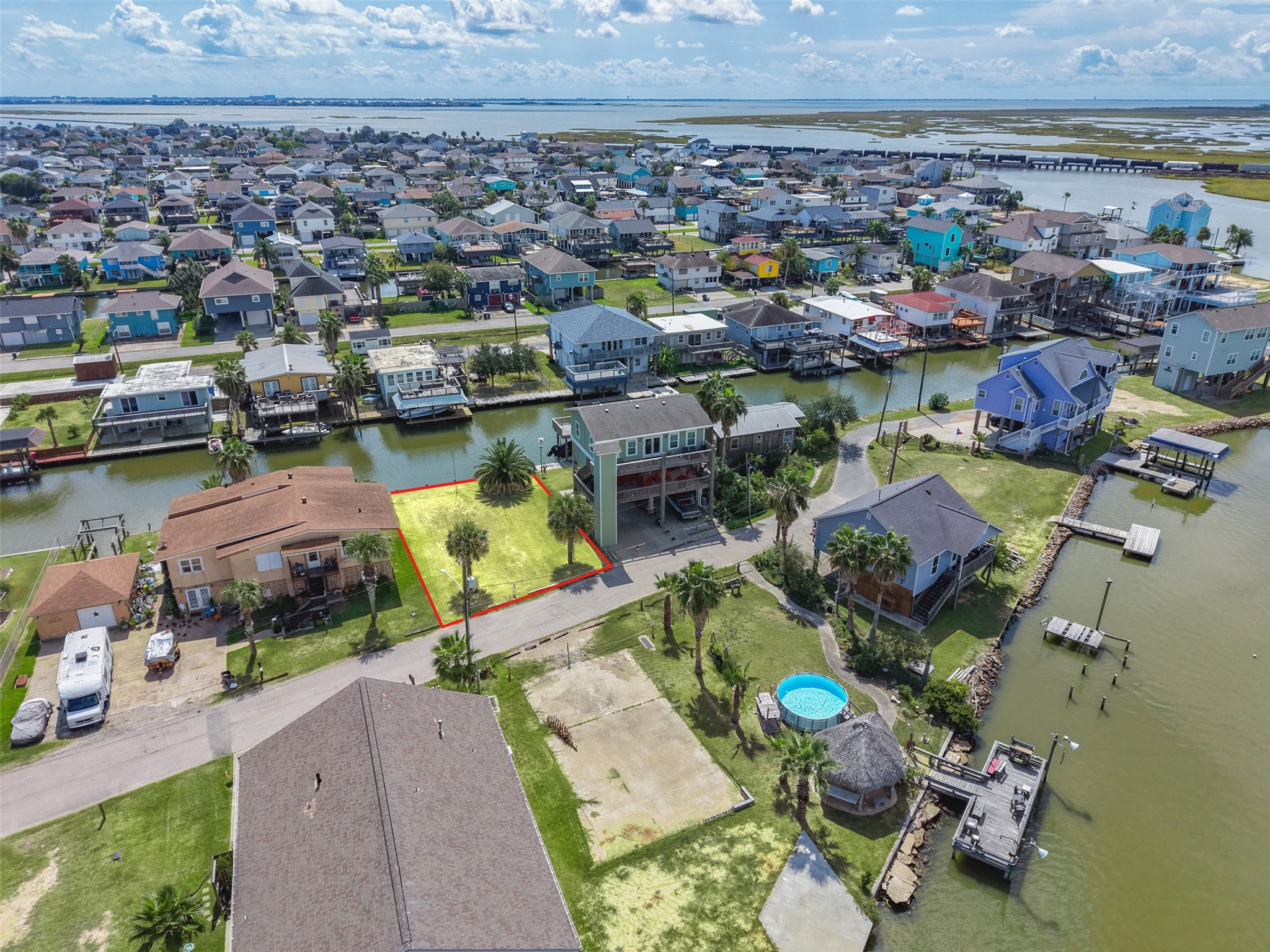 Out across the canals to the open bay beyond. You can see how little stands between the lot and open water! The Texas City Dike is about 6.6 miles away.