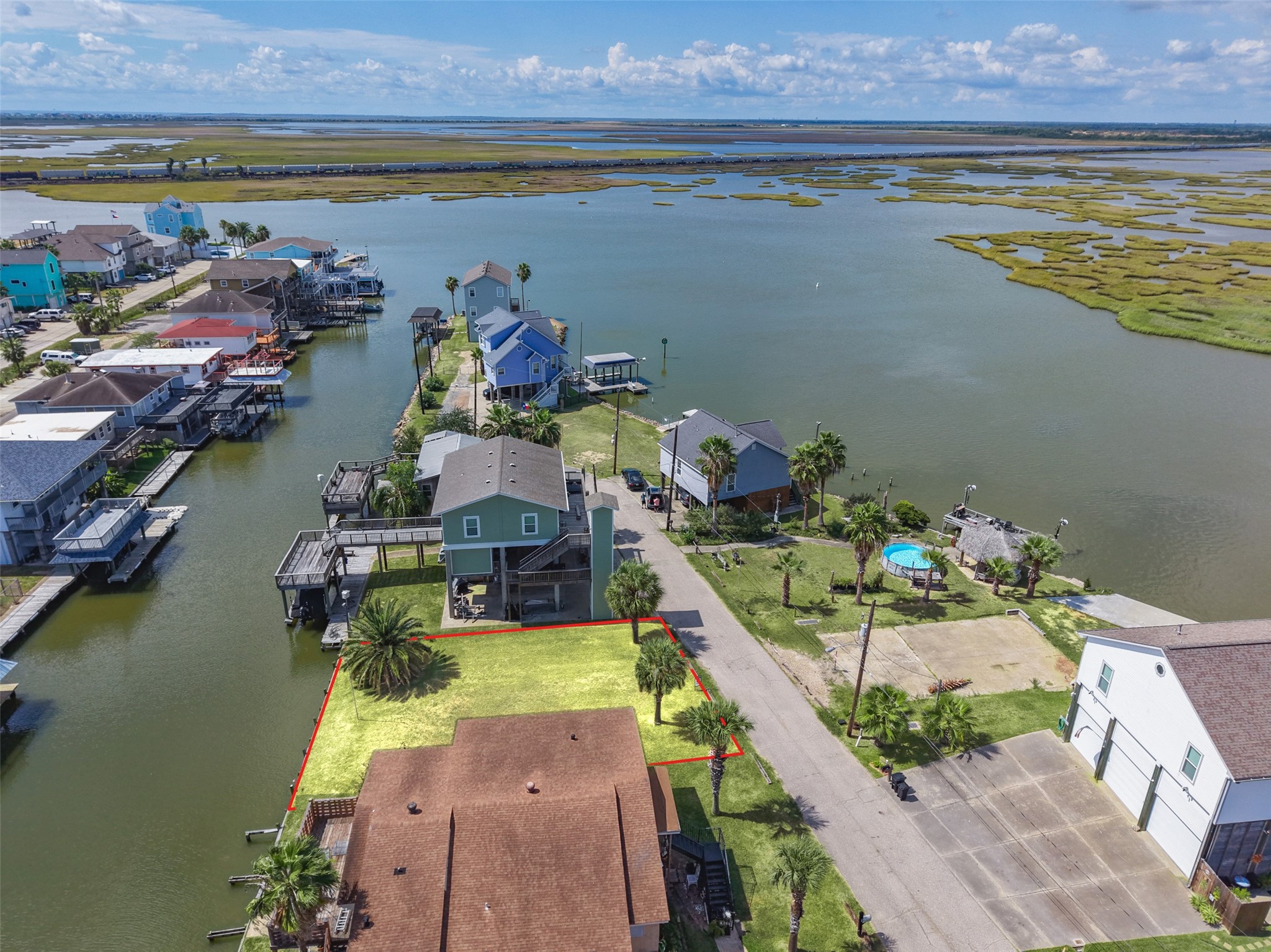 Same stretch, slightly different angle, so you can see how the canal runs behind every home here. A boat can tie up right out back, and the open water is a short idle away. Louis' Bait Camp & Restaurant is about 0.4 miles away for bait on the way out and supper on the way back. Same stretch, slightly different angle, so you can see how the canal runs behind every home here. A boat can tie up right out back, and the open water is a short idle away. Louis' Bait Camp & Restaurant is about 0.4 miles away for bait on the way out and supper on the way back.