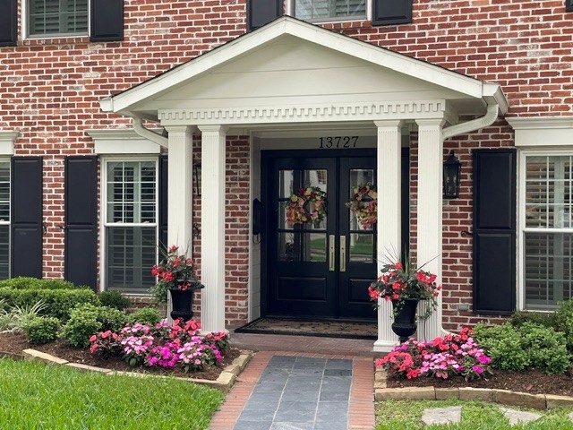 Gorgeous entryway has double doors and tasteful wallpaper. (2023) Professional photos coming next week! Gorgeous entryway has double doors and tasteful wallpaper. (2023) Professional photos coming next week!