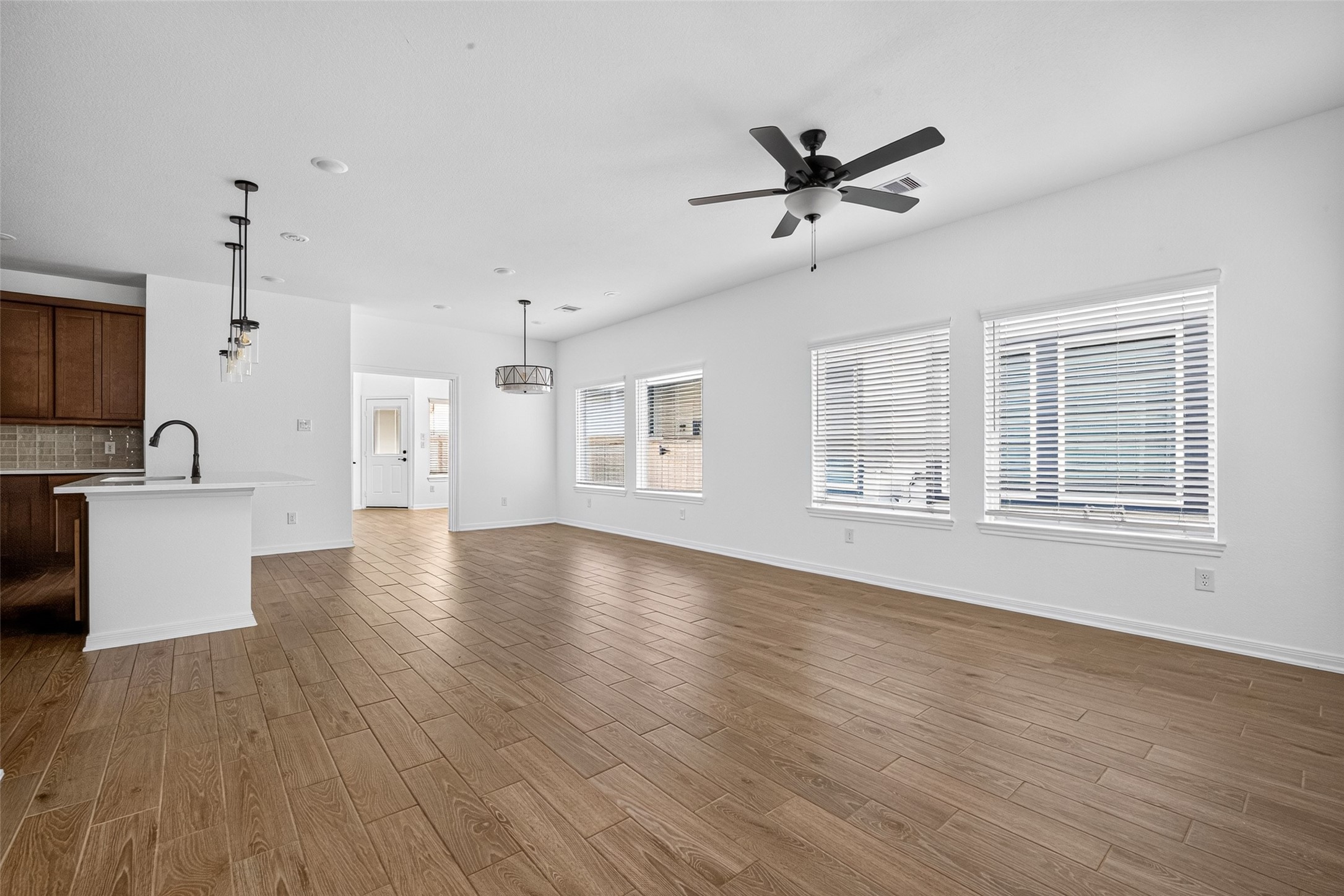 View of open dining, living and kitchen areas