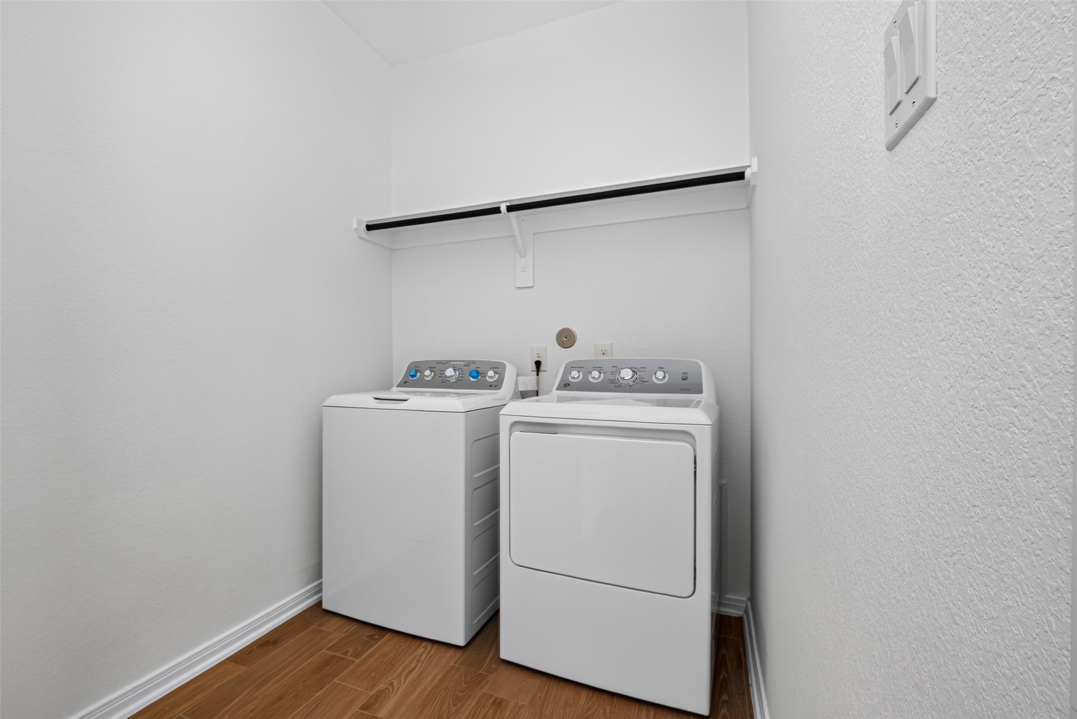 Laundry room with washer and dryer included