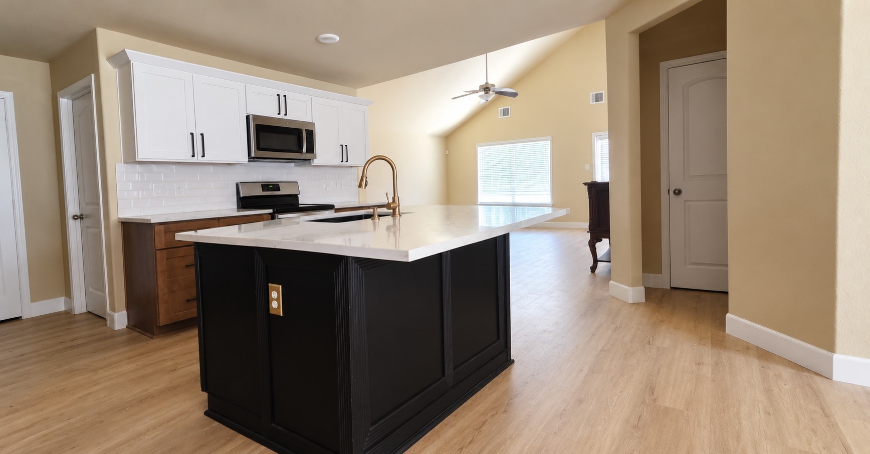 Recently renovated Kitchen features all wood cabinets with soft close drawers