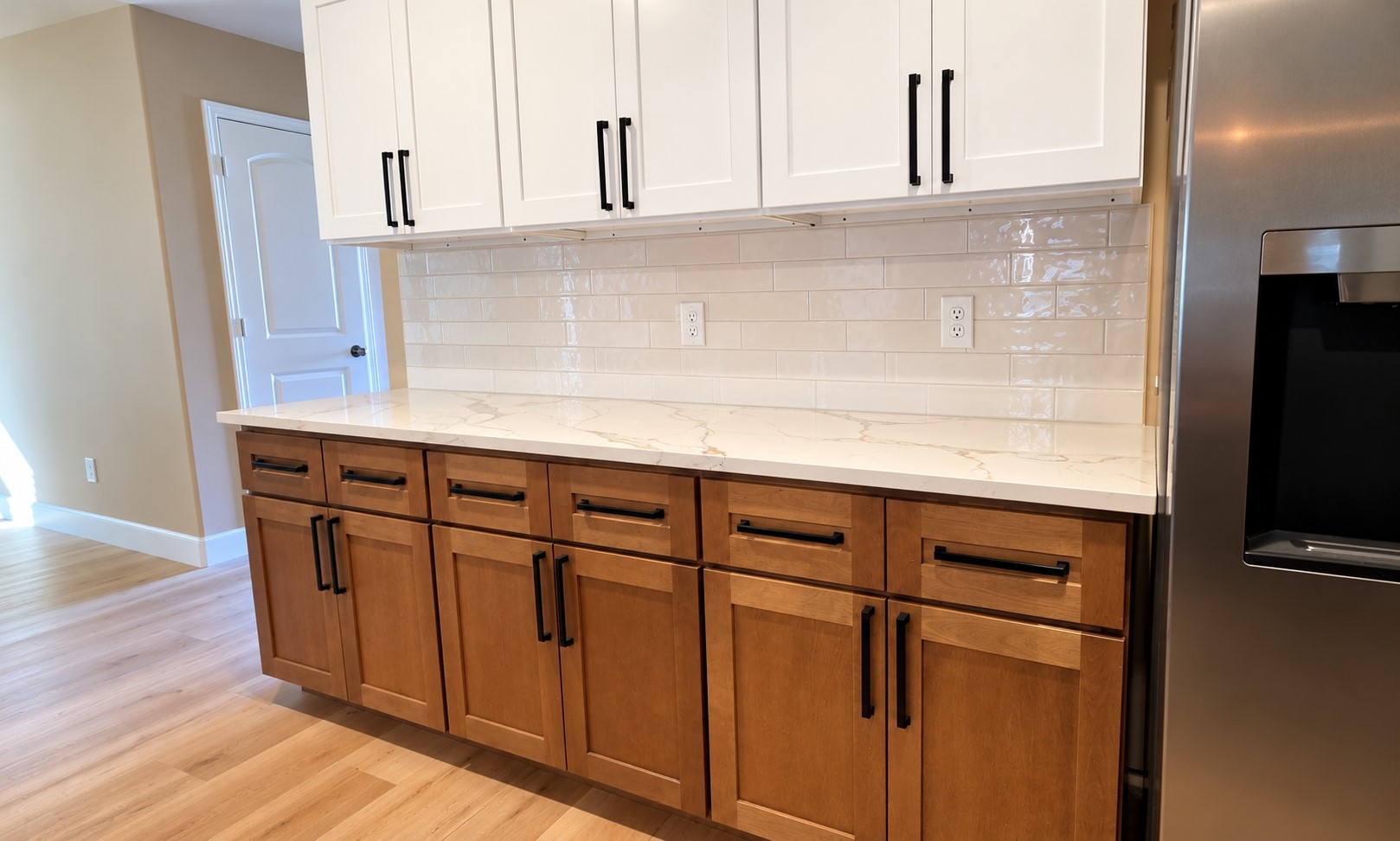Lots counter space features and gorgeous subway tile back splash through out the kitchen