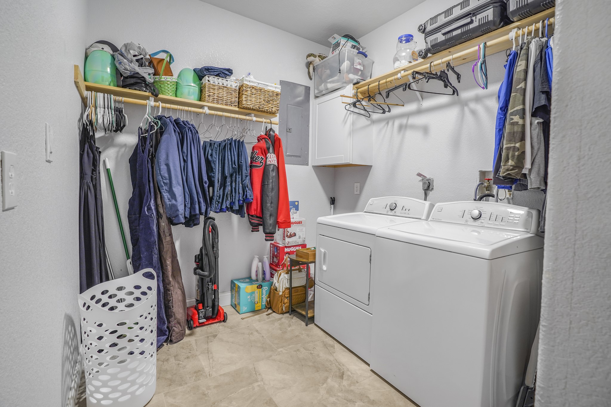Full laundry room in the primary room of the second house.