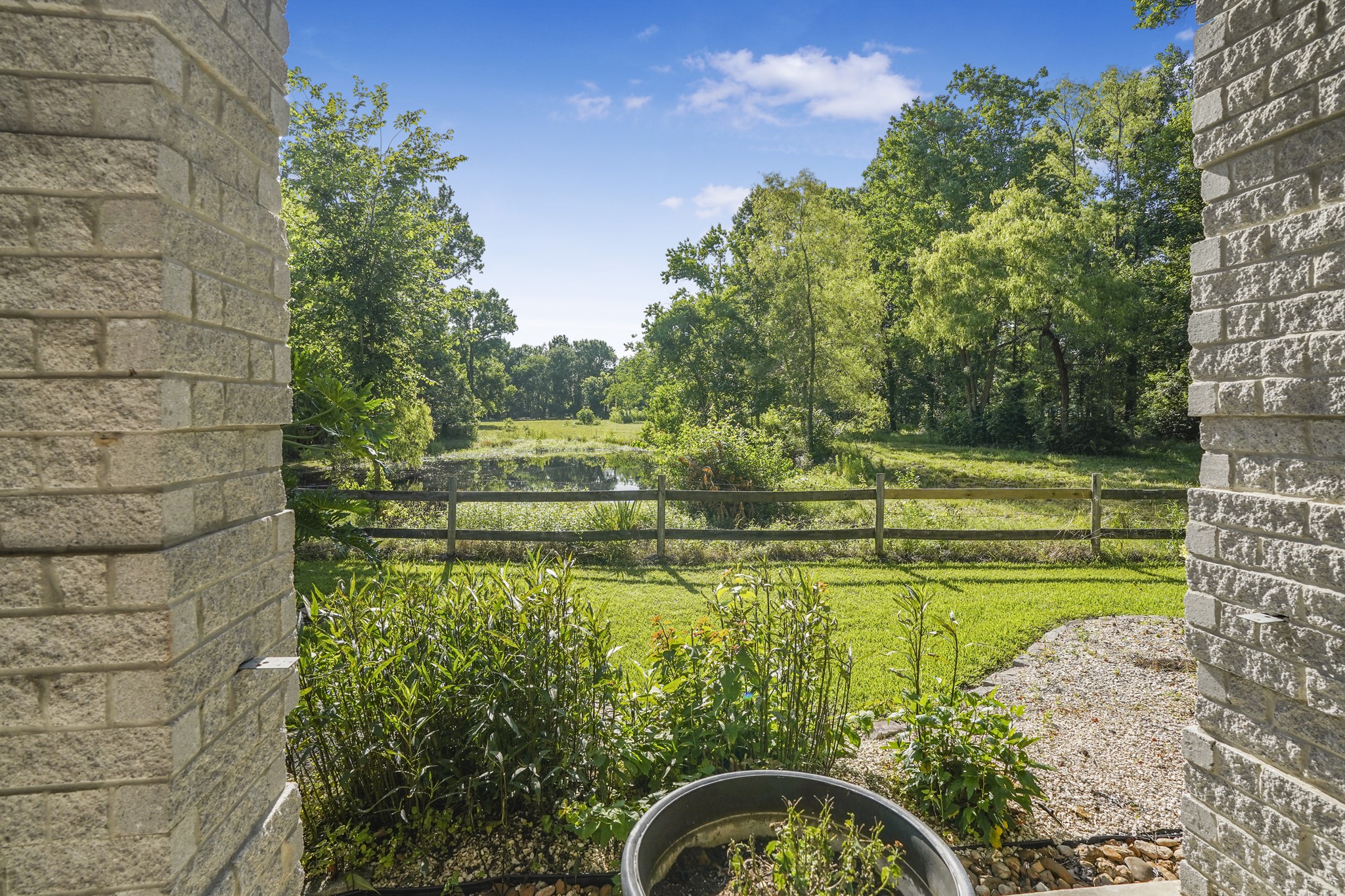 A view of the pond in front of the main house.