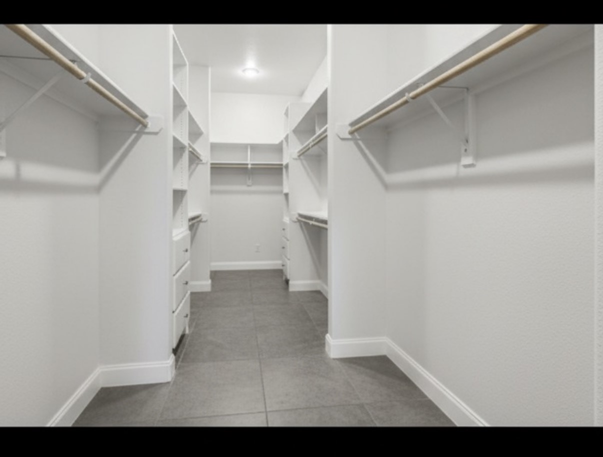 Huge primary closet! It is L shaped and measures to be 29 feet long!