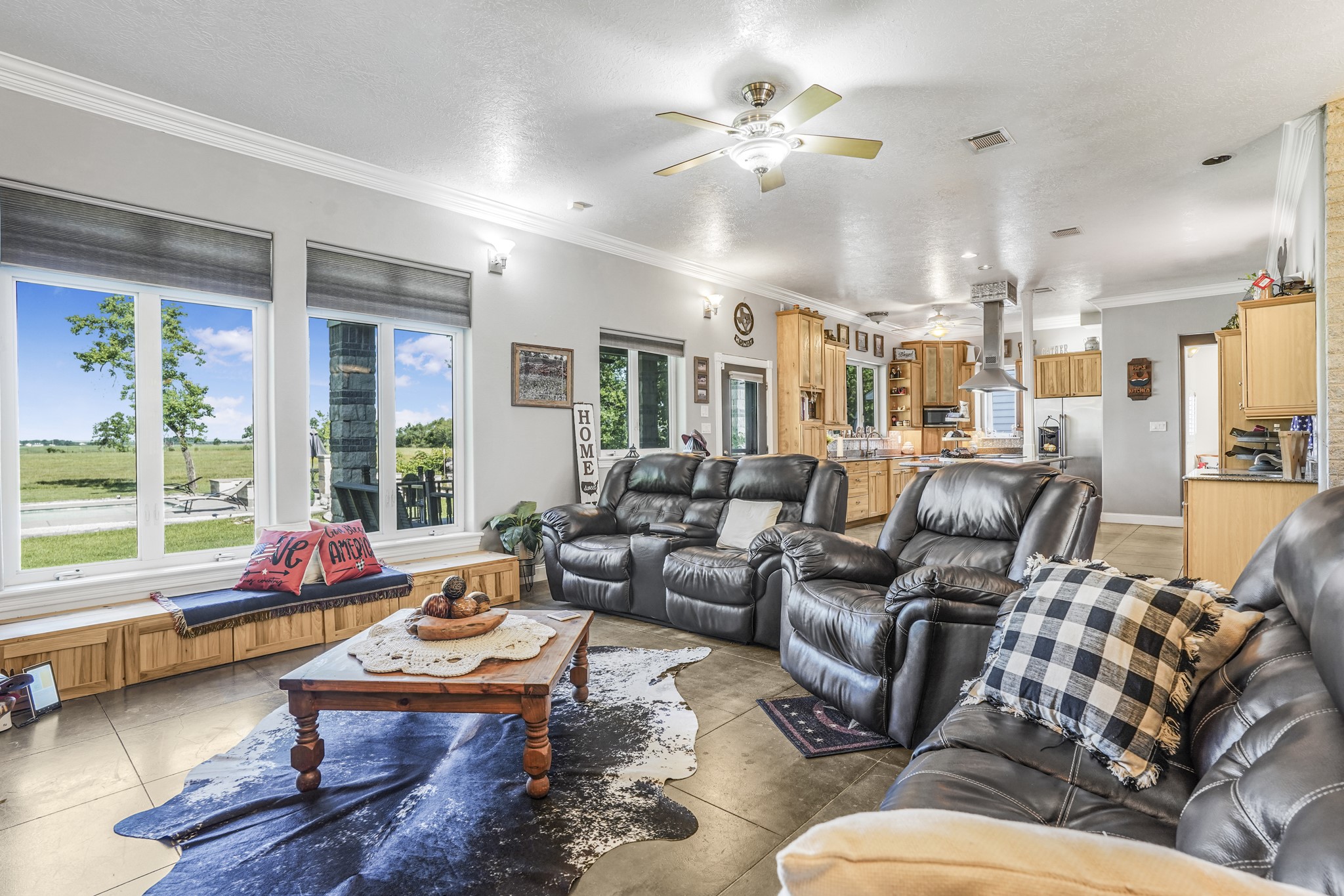 Living room has a great view to the pool.