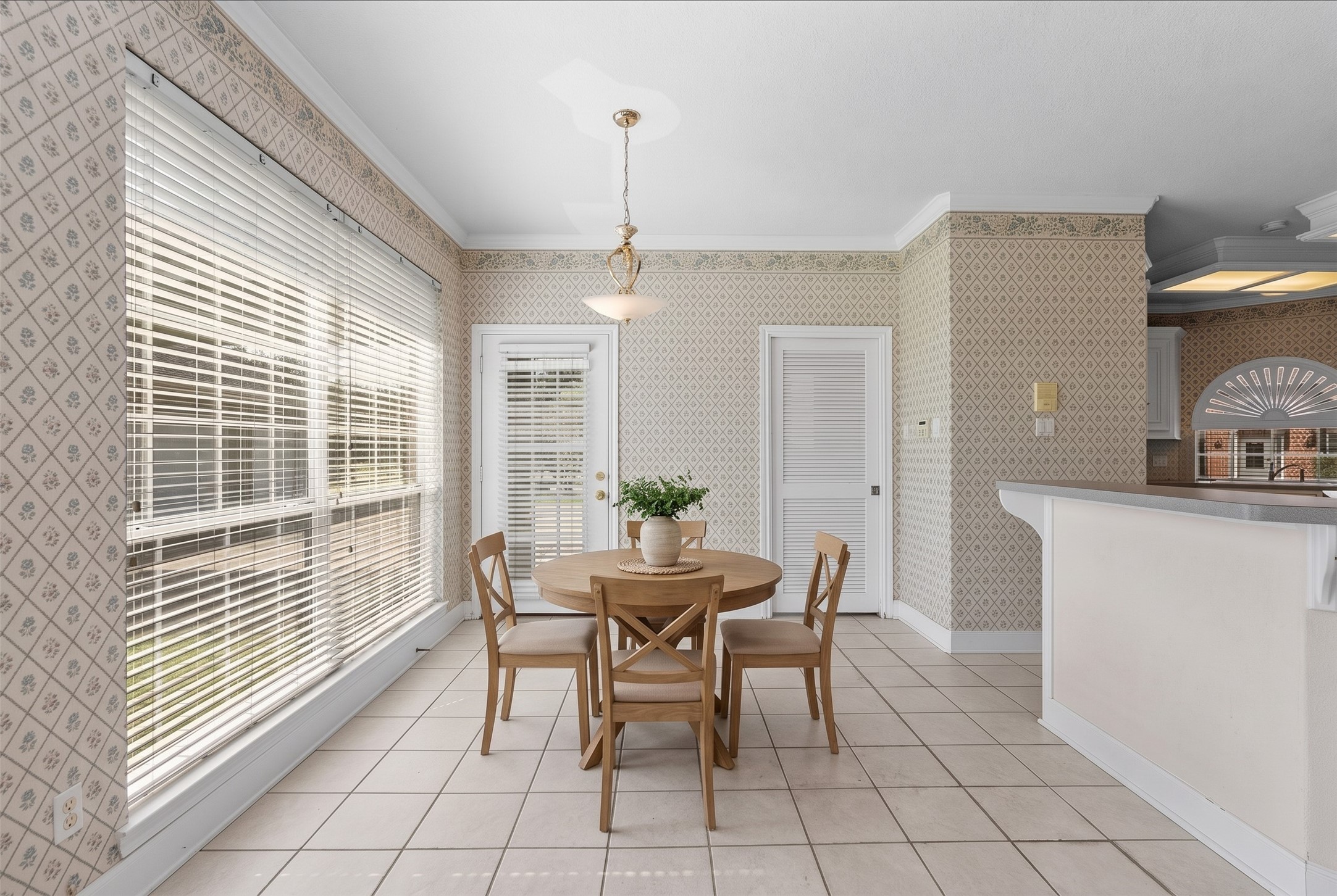 Designed for effortless daily living, this bright 13x14 dining area connects seamlessly to the kitchen.