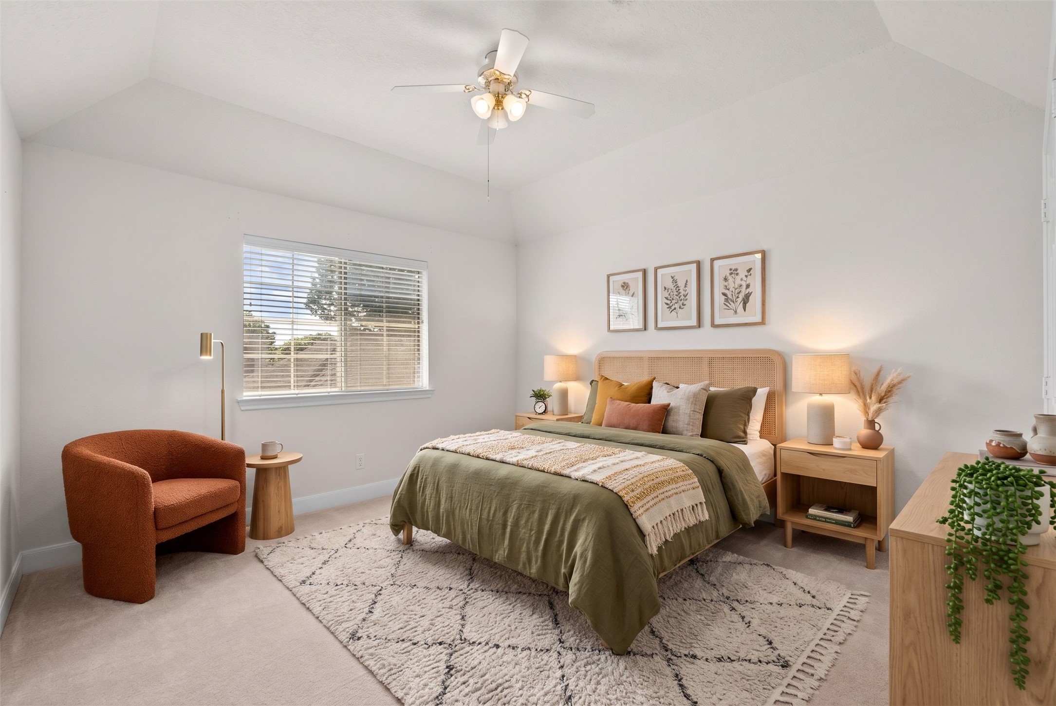 High ceilings make this guest room feel noticeably larger and more breathable.